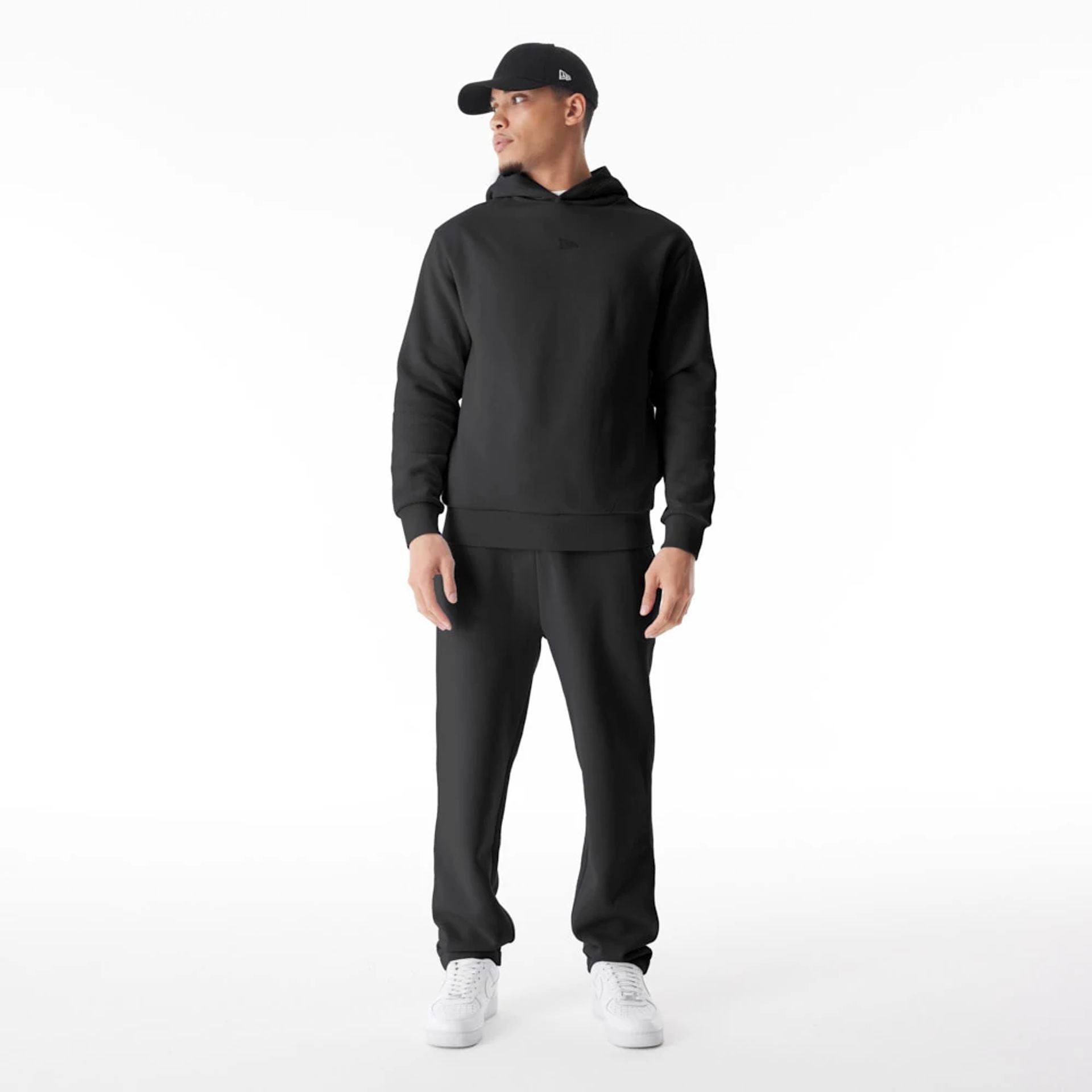 The Male model is wearing  New Era Black Straight Leg Joggers  5