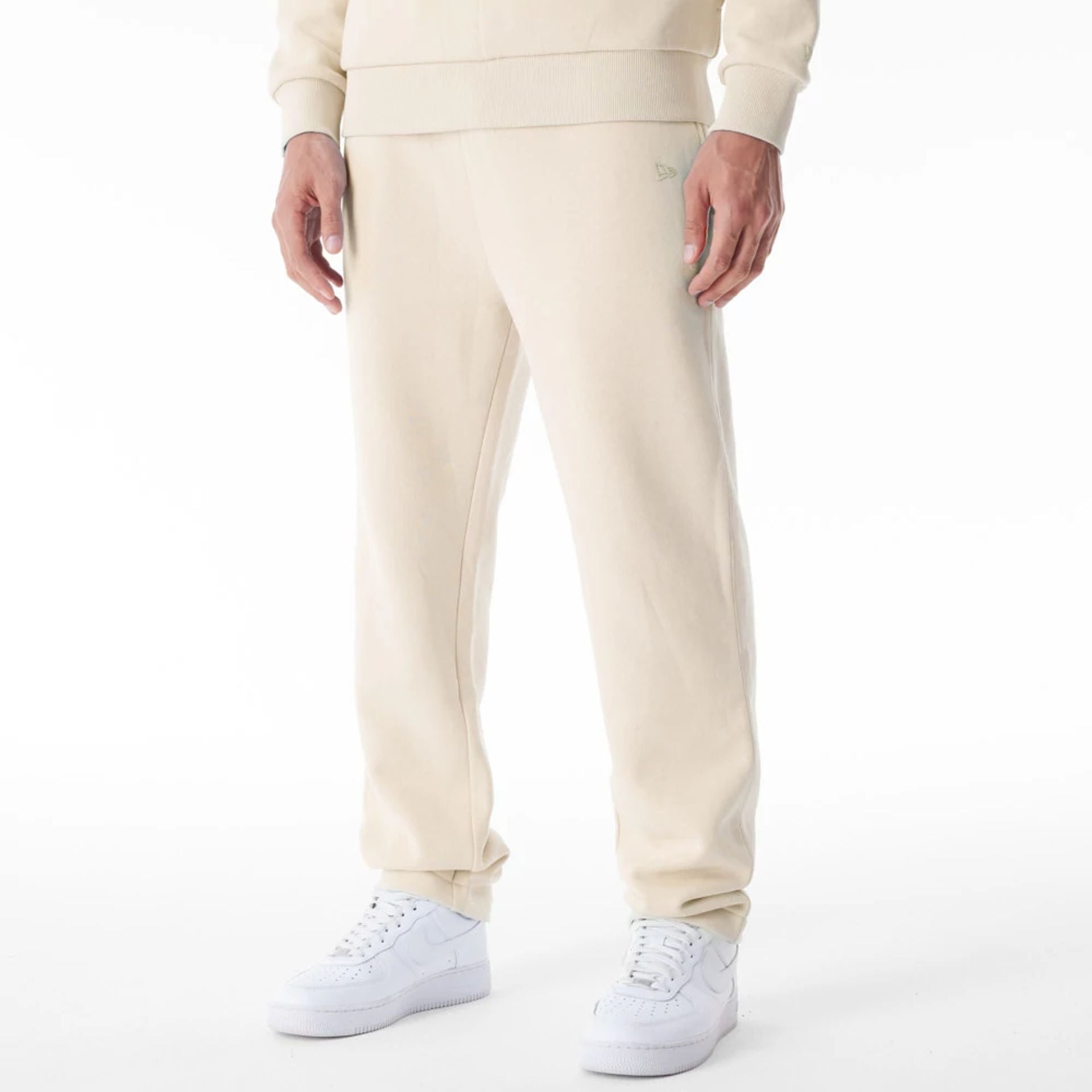 The Male model is wearing  New Era Cream Straight Leg Joggers  1