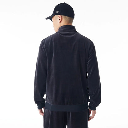 The Male model is wearing  New Era Velour Black Track Jacket  11