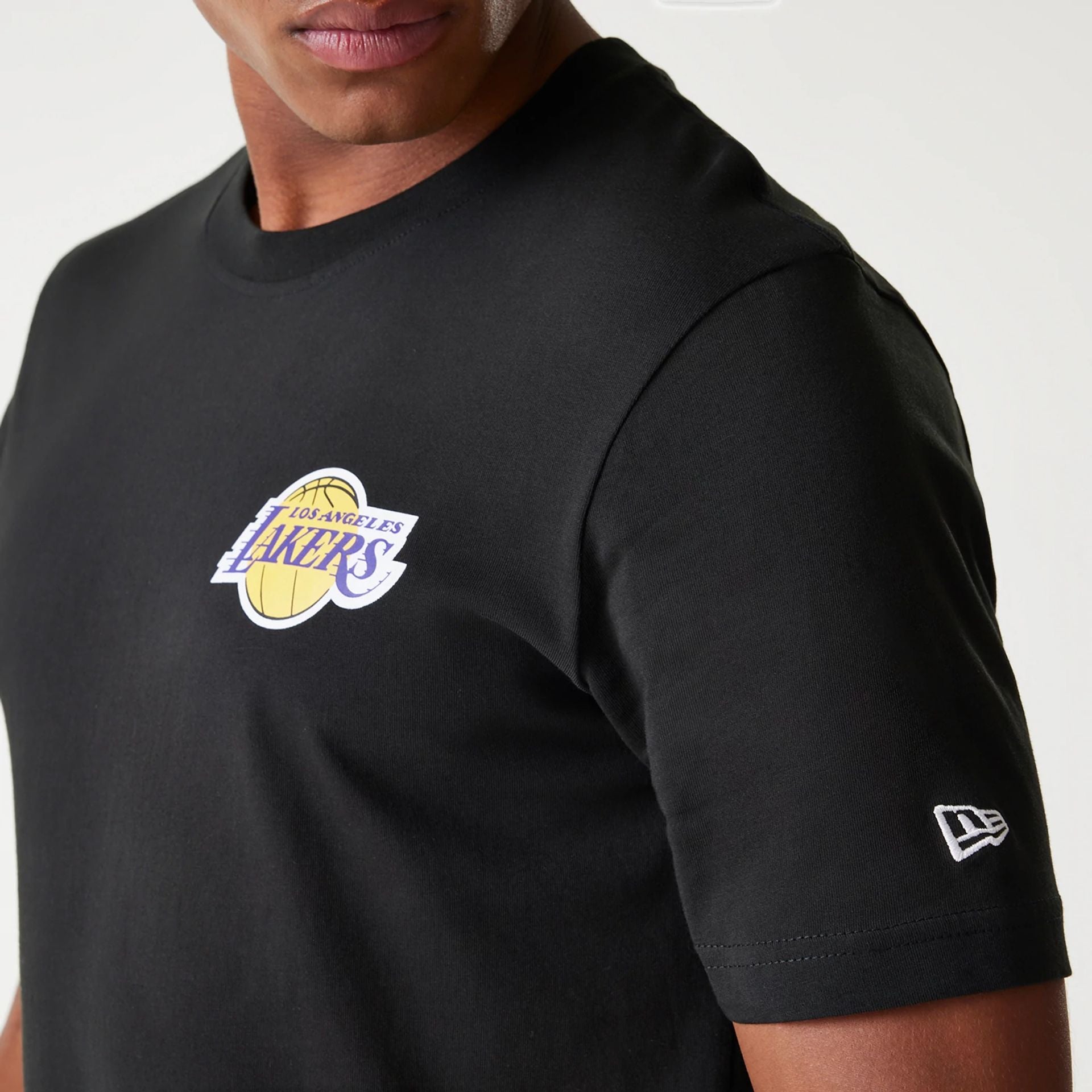 The Male model is wearing LA Lakers NBA Tip Off Black T-Shirt 5