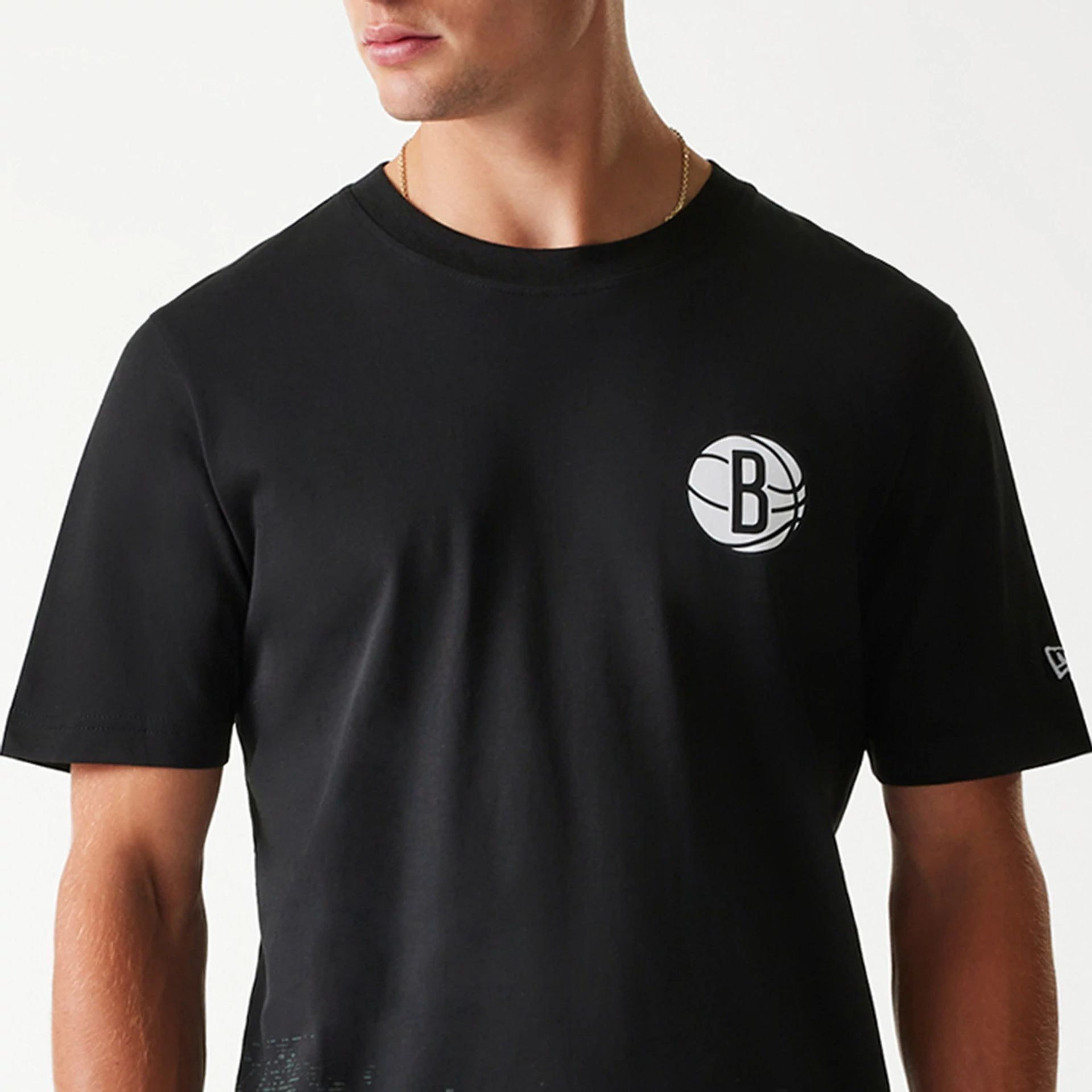 The Male model is wearing Brooklyn Nets NBA Tip Off Black T-Shirt 3