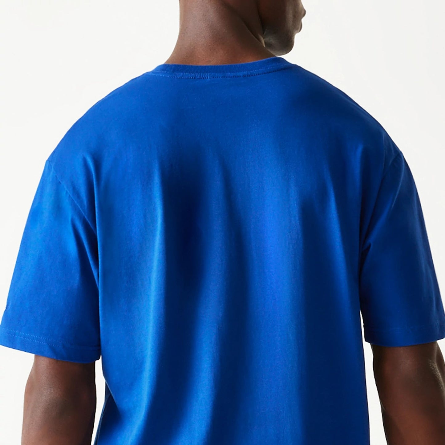 The Male model is wearing New York Knicks Sport Classic Blue T-Shirt 7