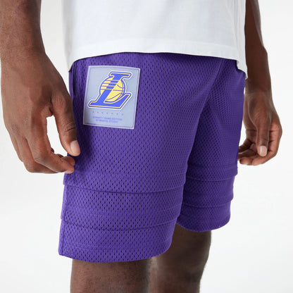 The Male model is wearing LA Lakers Bristol Studio x NBA Purple Shorts 4