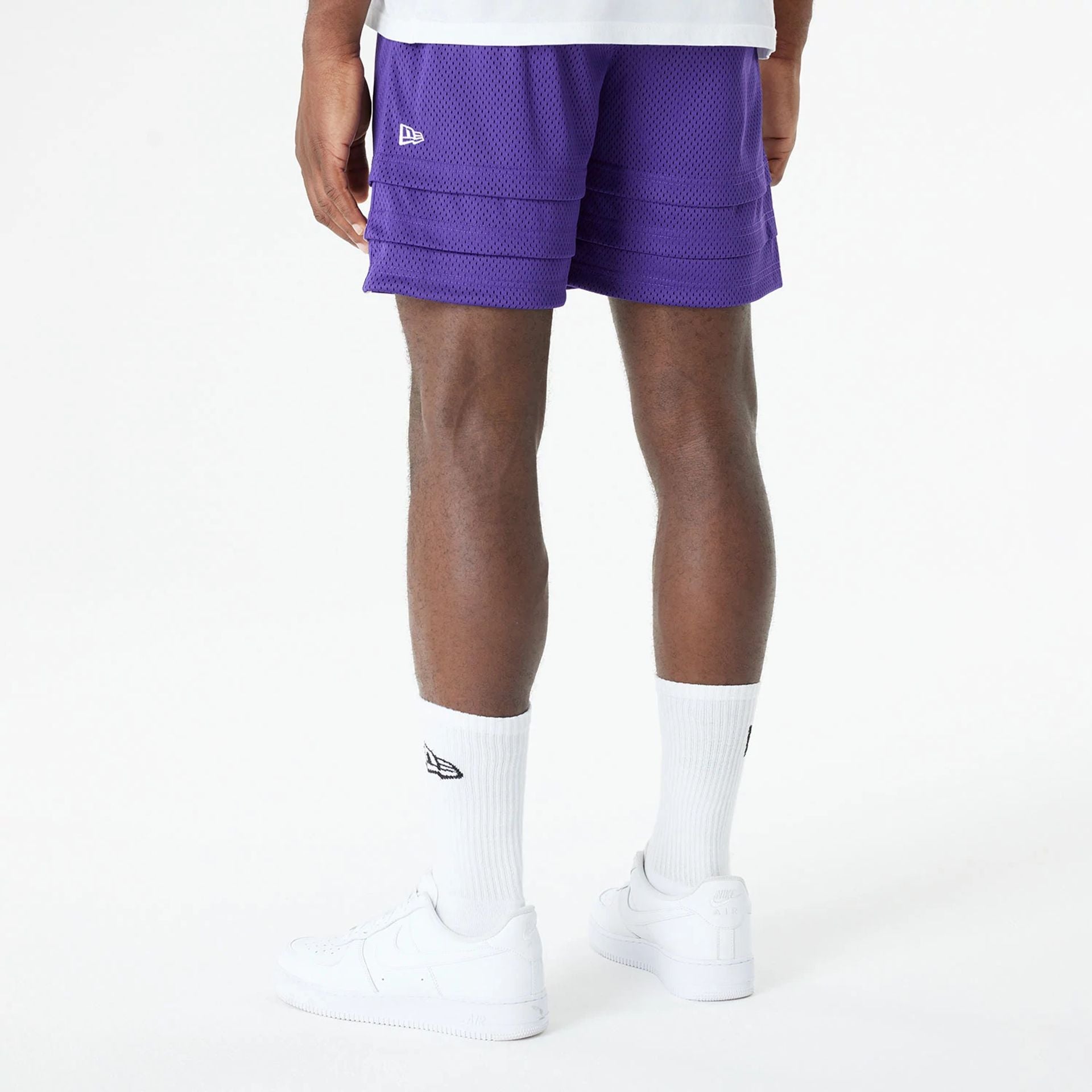 The Male model is wearing LA Lakers Bristol Studio x NBA Purple Shorts 2