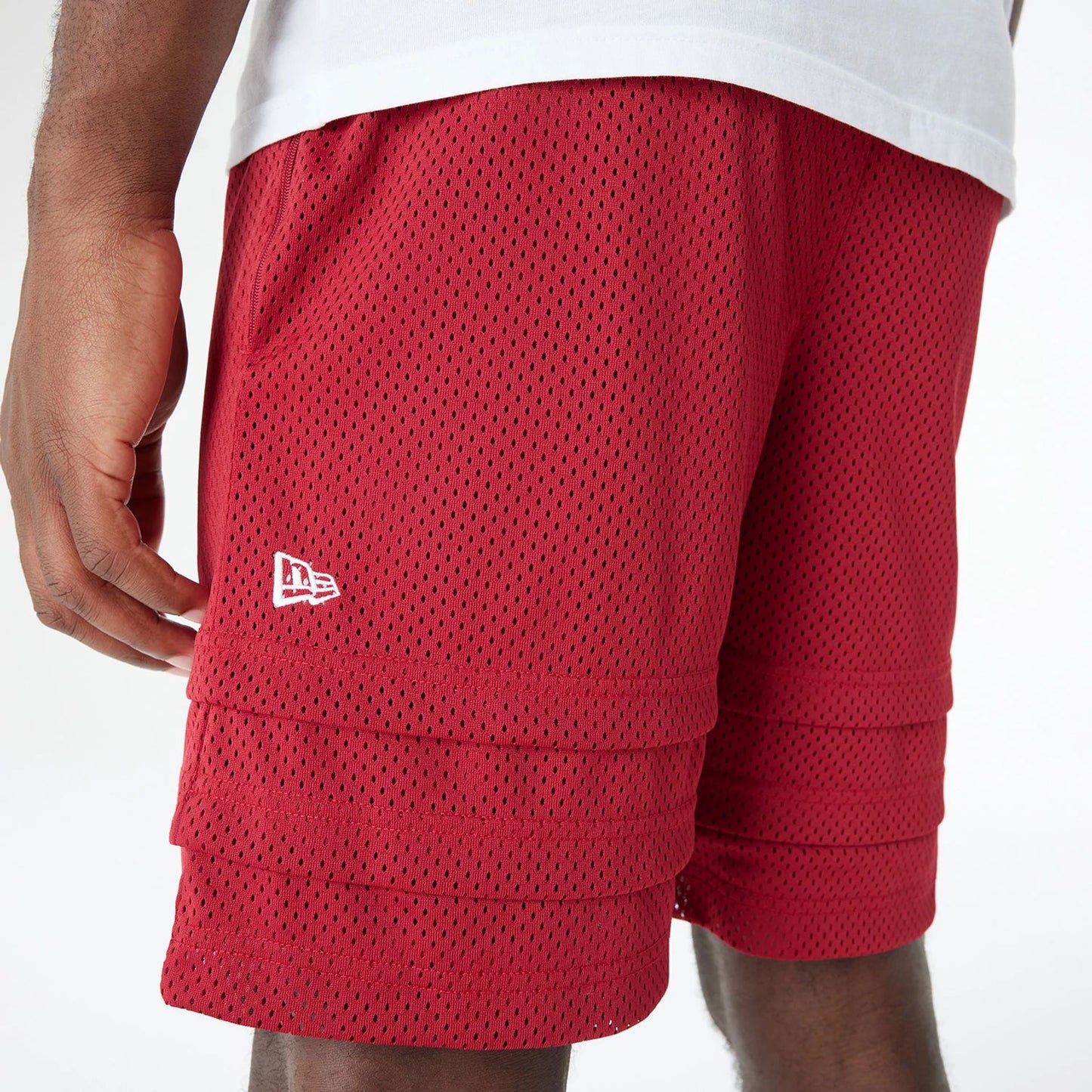 The Male model is wearing Miami Heat Bristol Studio x NBA Dark Red Shorts 4