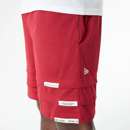 The Male model is wearing Miami Heat Bristol Studio x NBA Dark Red Shorts 5