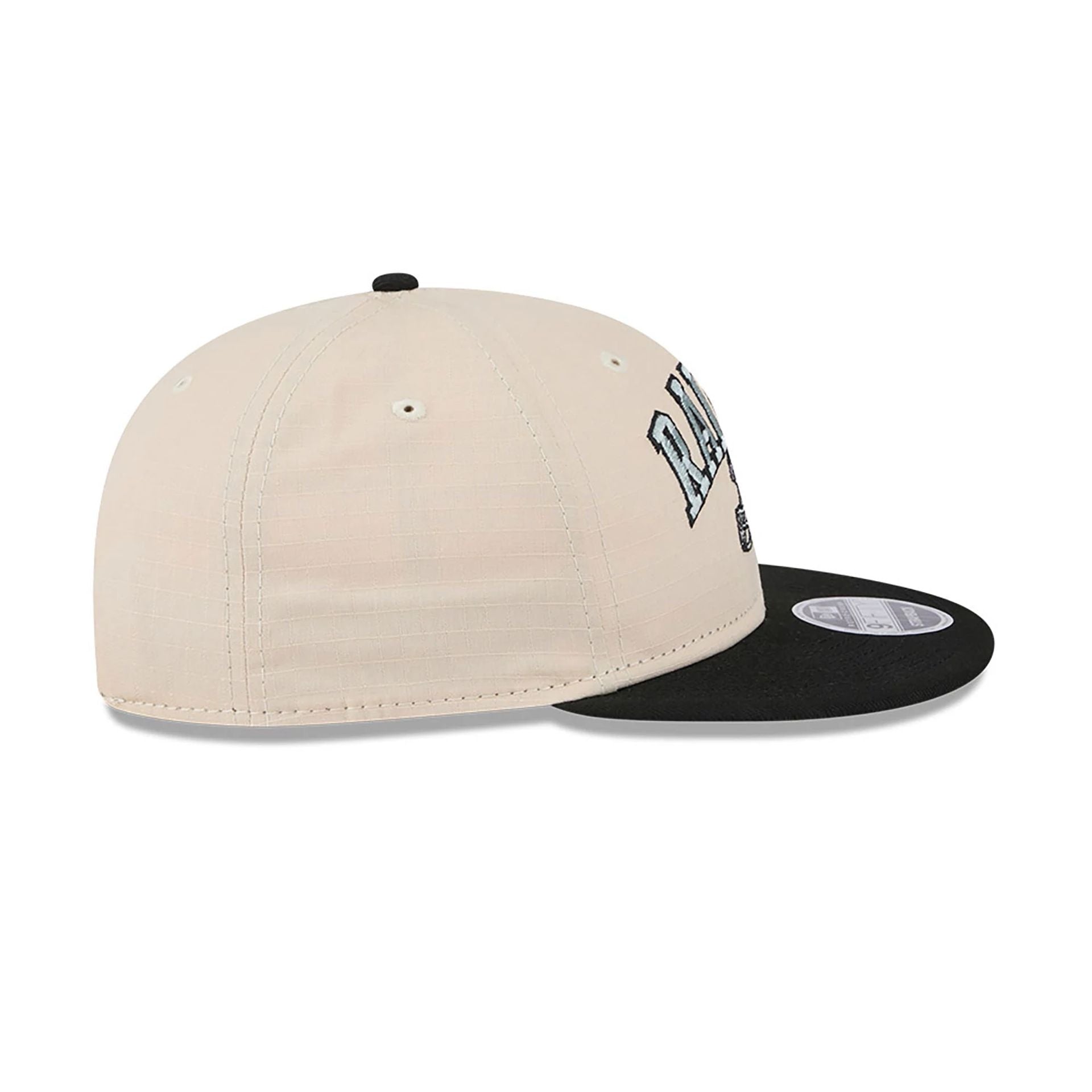 This is a Las Vegas Raiders Historic Helmet Beige Retro Crown 9FIFTY Snapback Cap 6