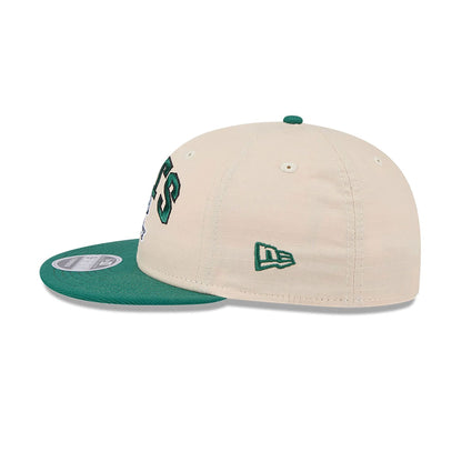 This is a New York Jets Historic Helmet Beige Retro Crown 9FIFTY Snapback Cap 7