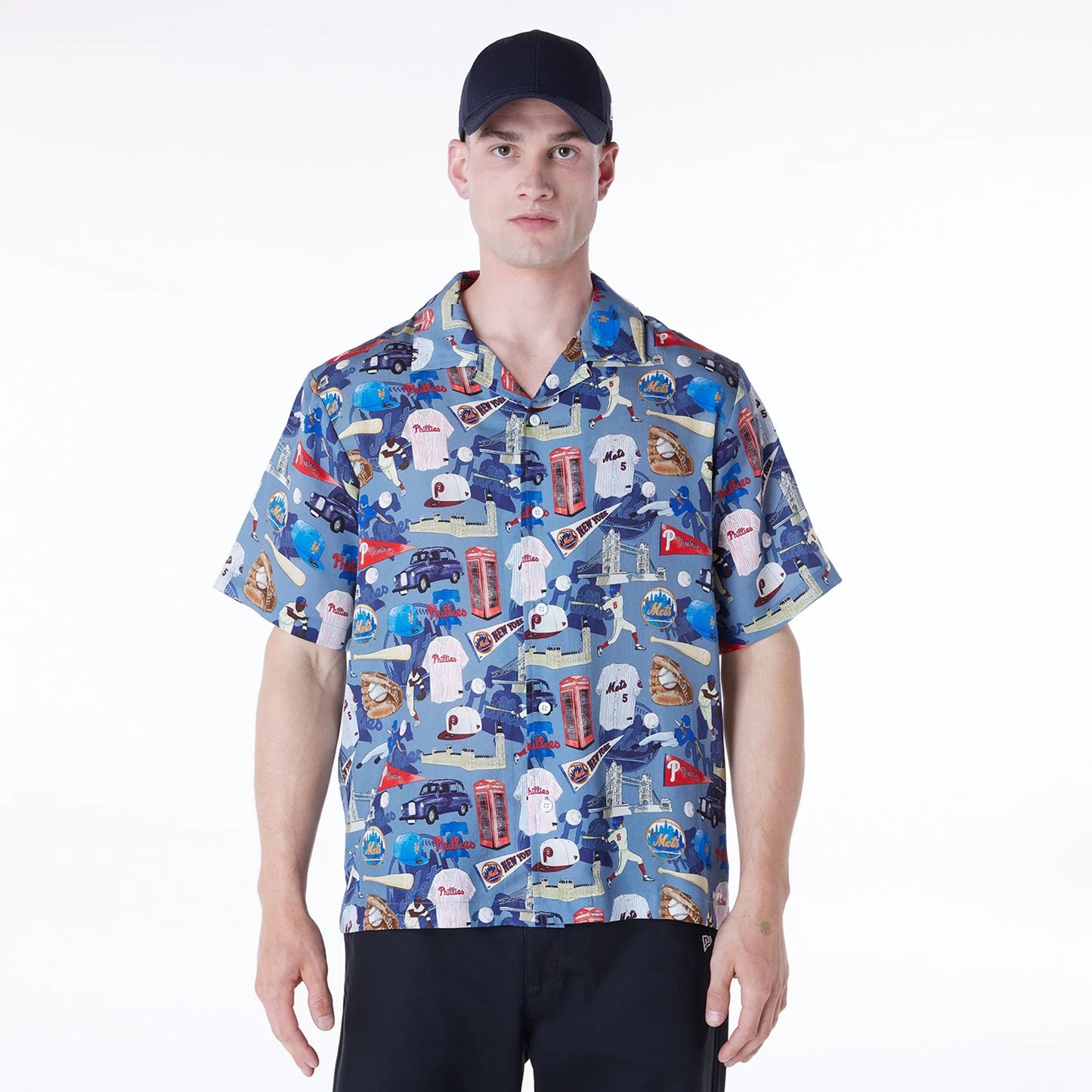 The Male model is wearing MLB Multi Team MLB London Games 2024 Revere Navy Short Sleeve Shirt 1