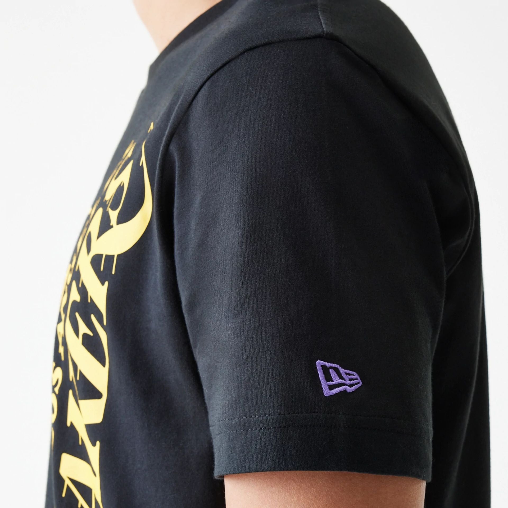 The Male model is wearing LA Lakers NBA City Edition Black T-Shirt 4