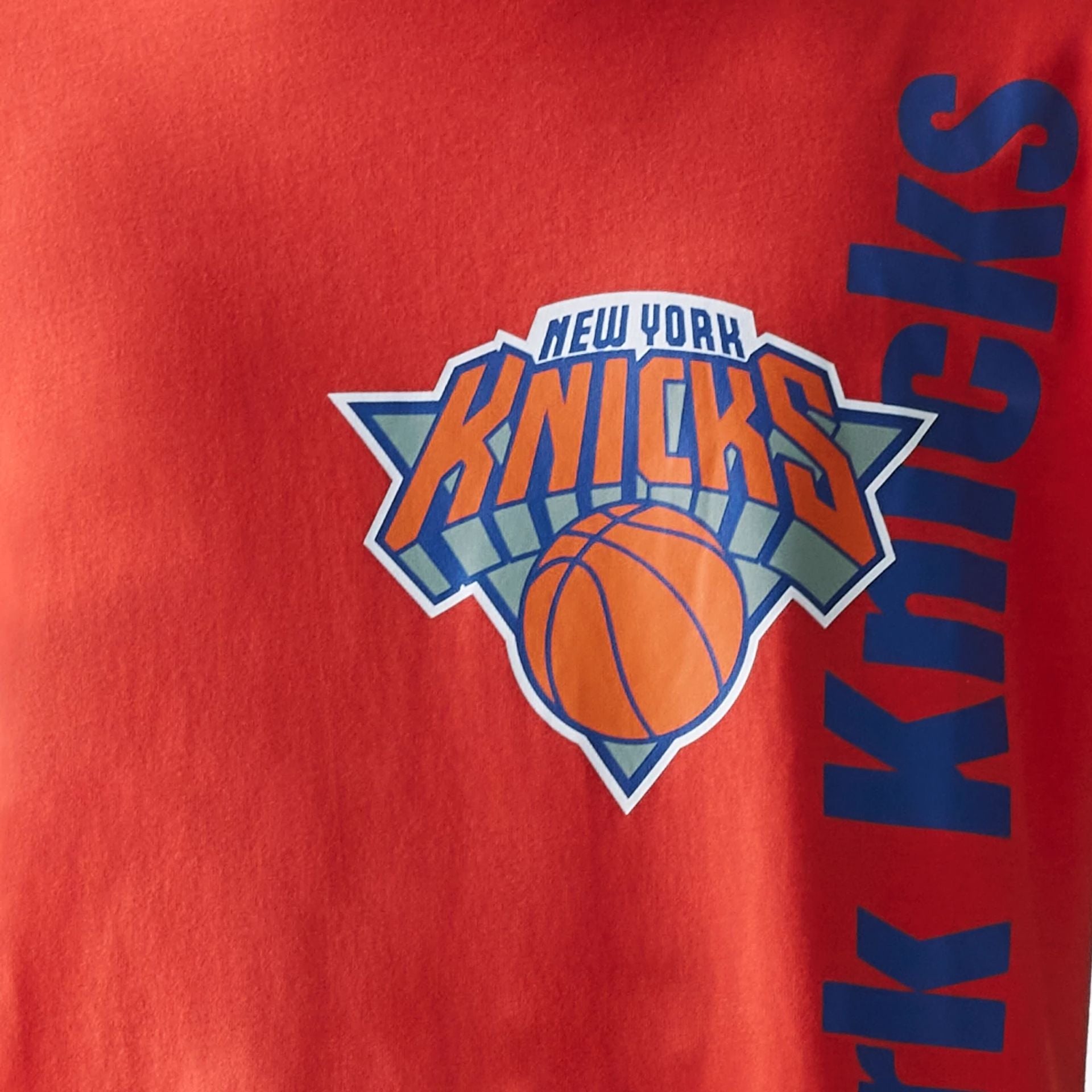 The Male model is wearing New York Knicks NBA City Edition Orange T-Shirt 4