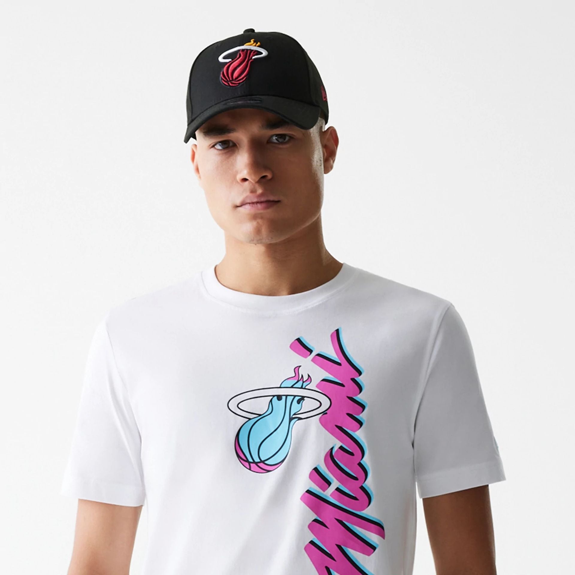 The Male model is wearing Miami Heat NBA City Edition White T-Shirt 6