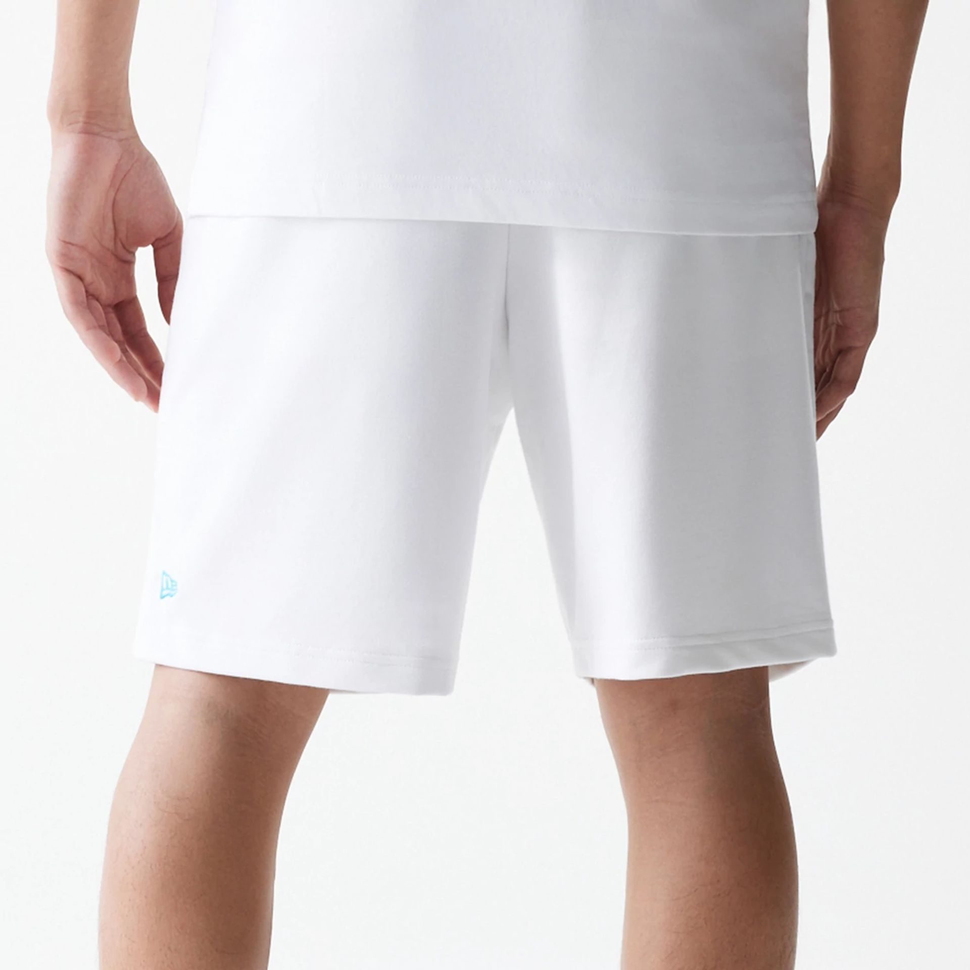 The Male model is wearing Miami Heat NBA City Edition Grey Shorts 7