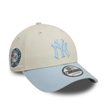 This is a New York Yankees World Series Patch Cream 9FORTY Adjustable Cap 1