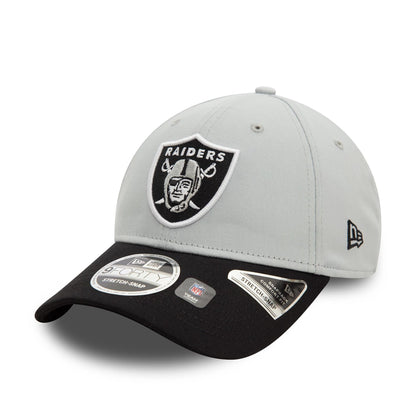 This is a Las Vegas Raiders NFL White 9FORTY Stretch Snap Adjustable Cap 1