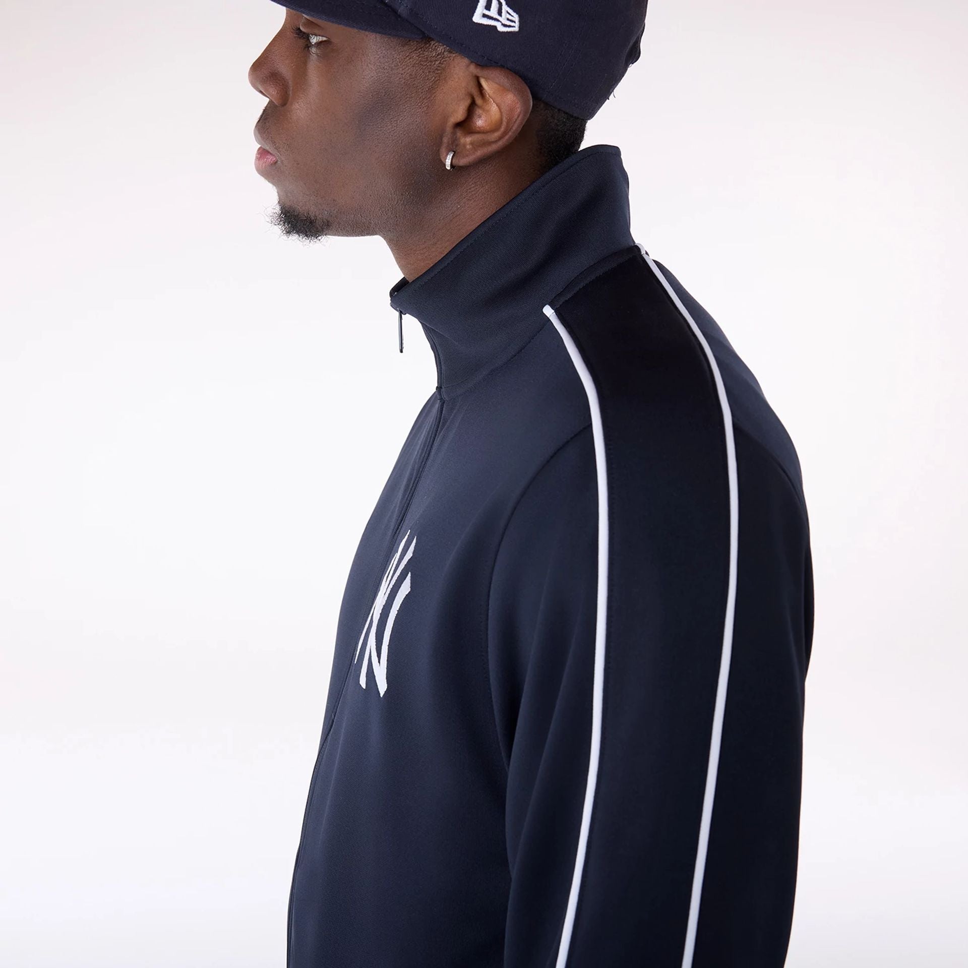 The Male model is wearing New York Yankees MLB Track Top Navy Track Jacket 6