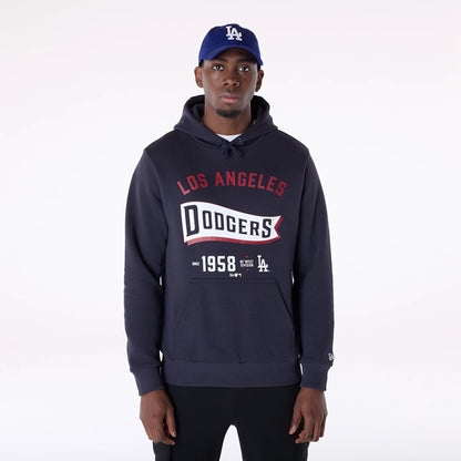 The Male model is wearing LA Dodgers MLB Pennant Graphic Navy Pullover Hoodie 1