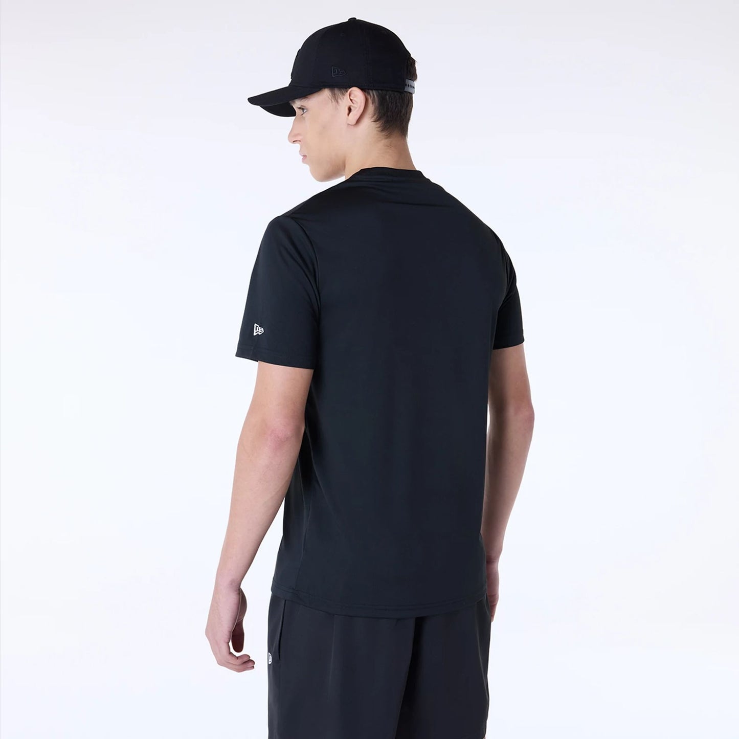 The Male model is wearing New York Yankees MLB Essential Black Top And Shorts Set 5