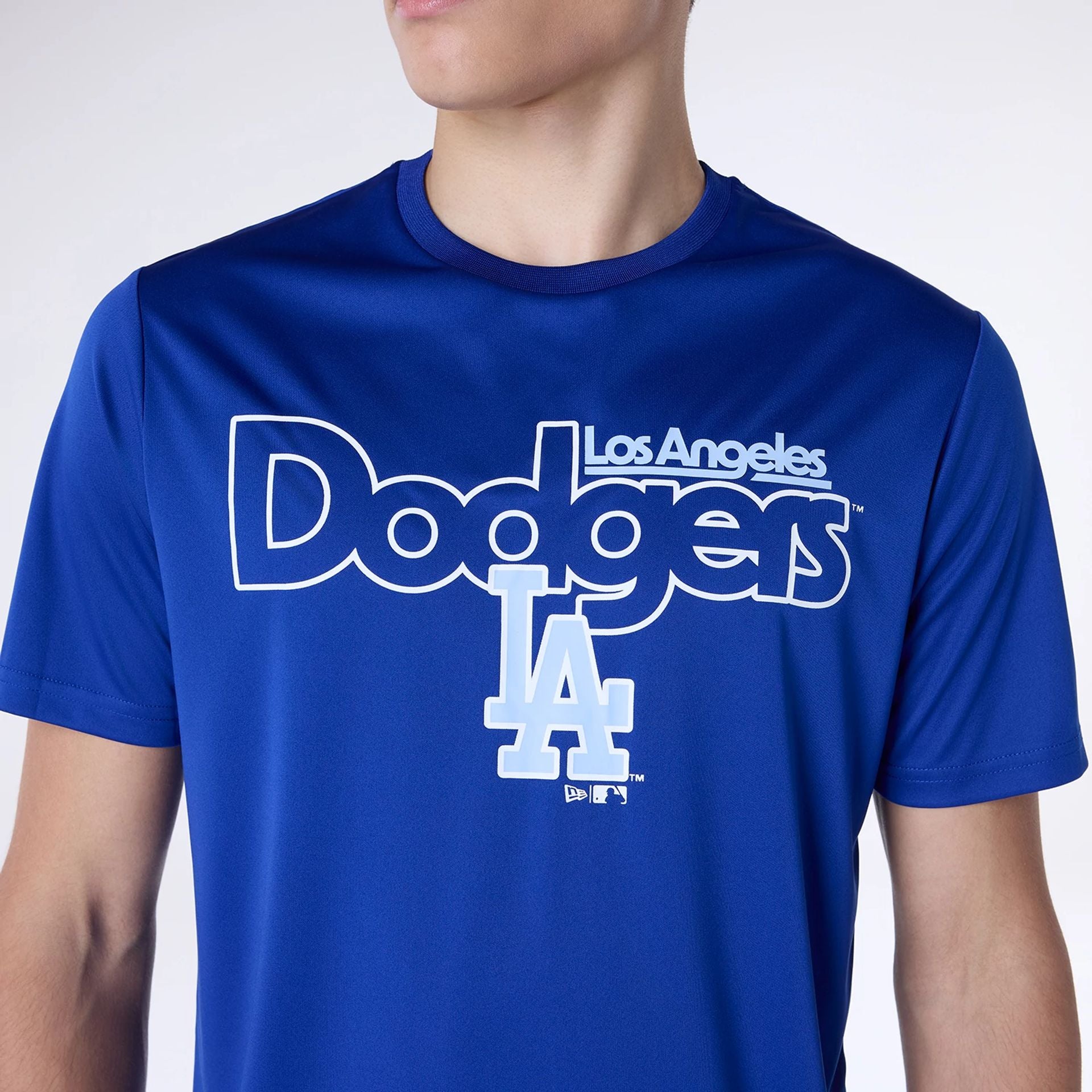 The Male model is wearing LA Dodgers MLB Essential Blue Top And Shorts Set 4