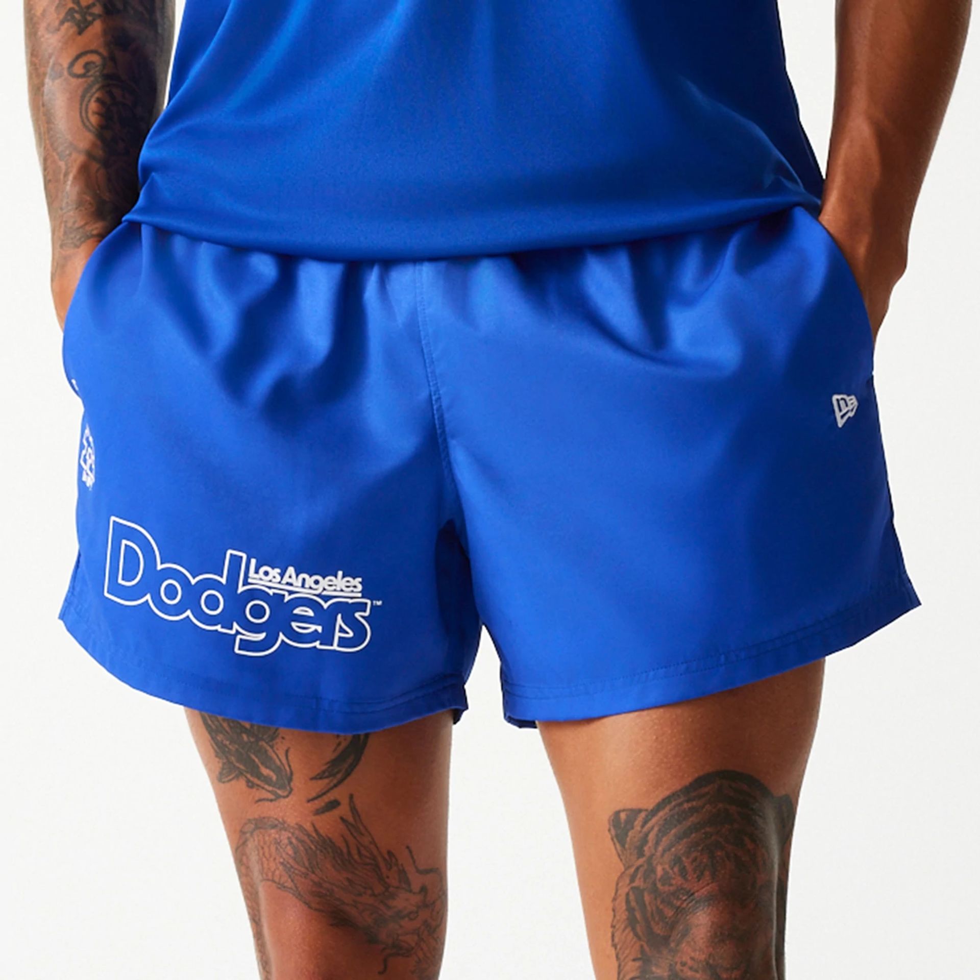 The Male model is wearing LA Dodgers MLB Essentials Blue Shorts 2