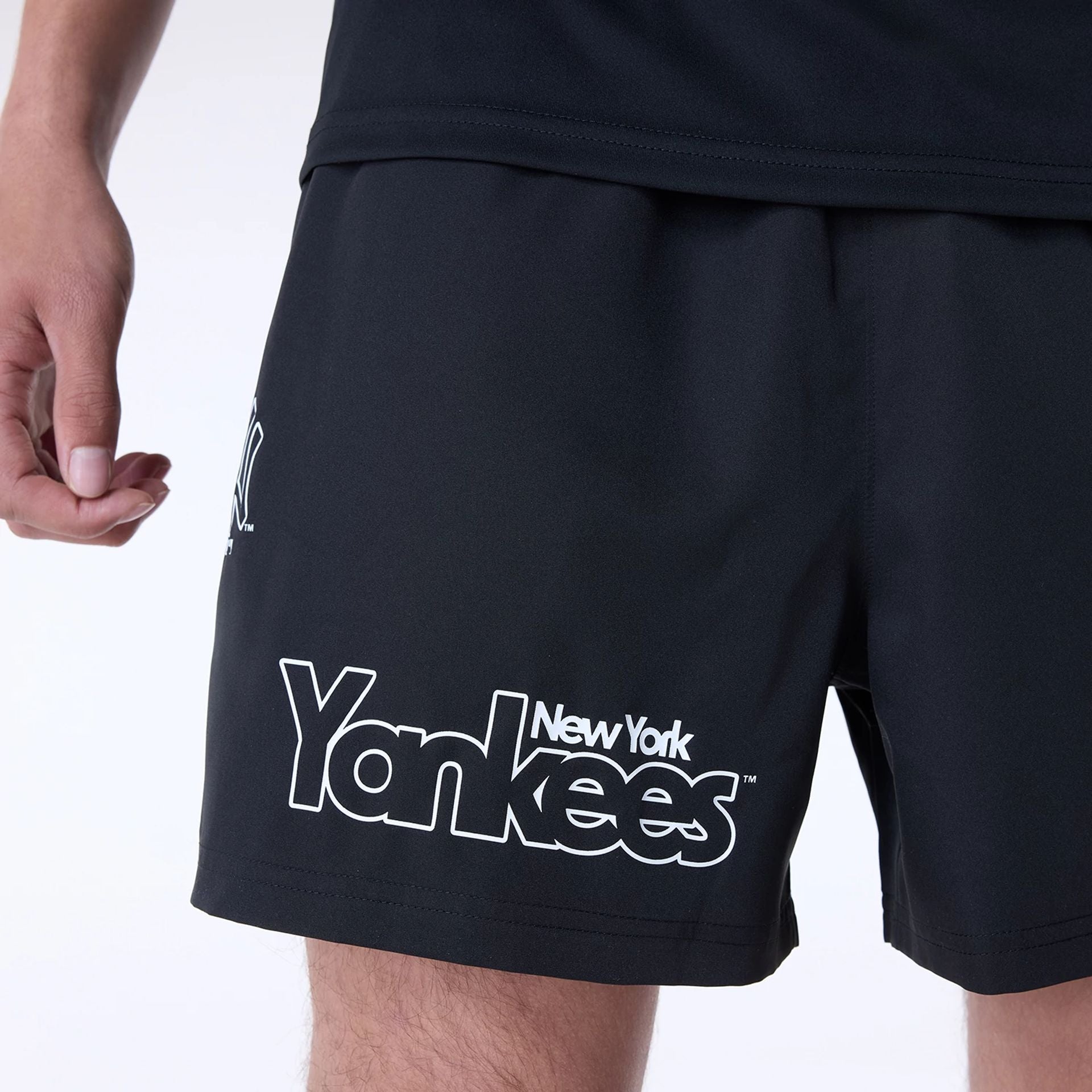 The Male model is wearing New York Yankees MLB Essentials Black Shorts 3