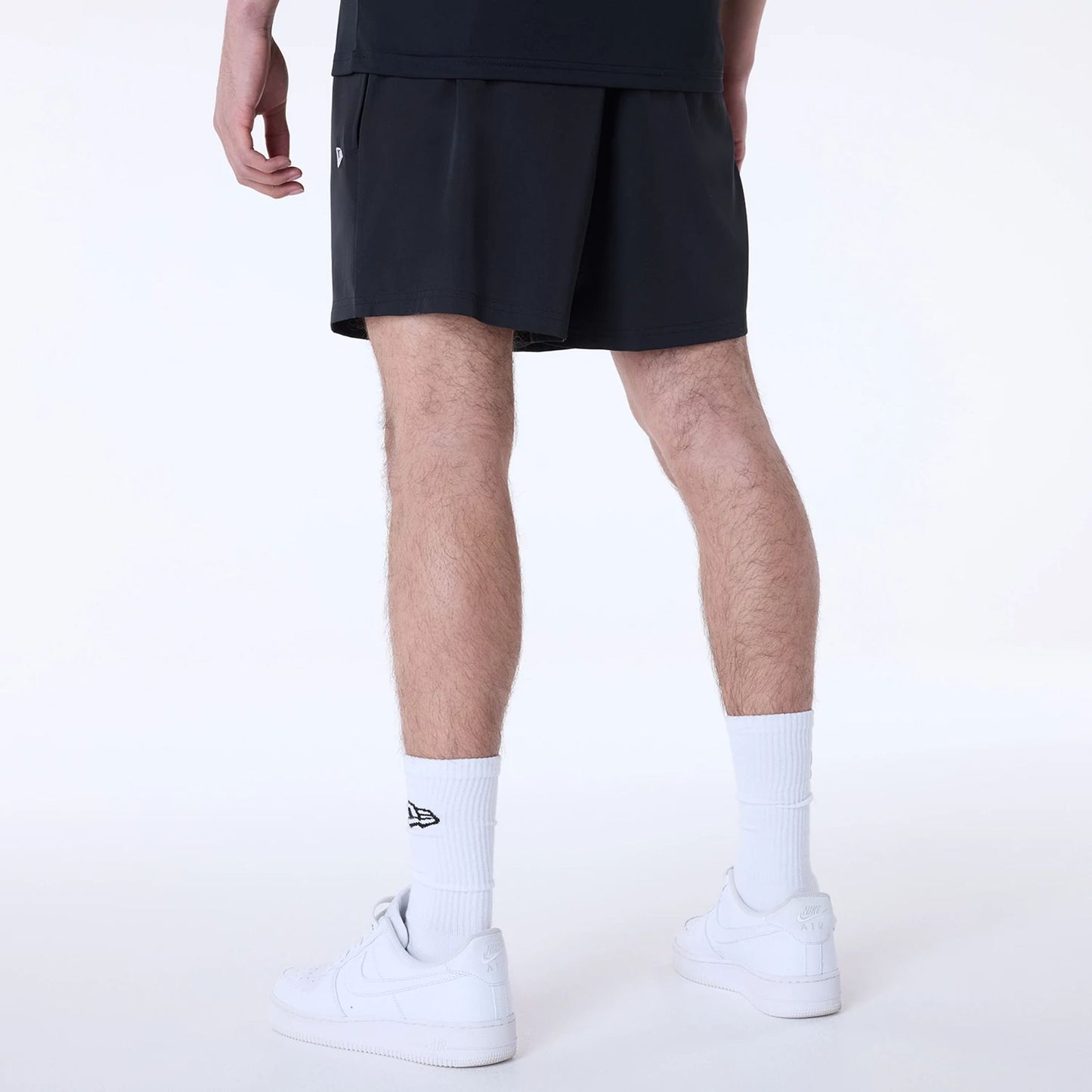 The Male model is wearing New York Yankees MLB Essential Black Top And Shorts Set 3