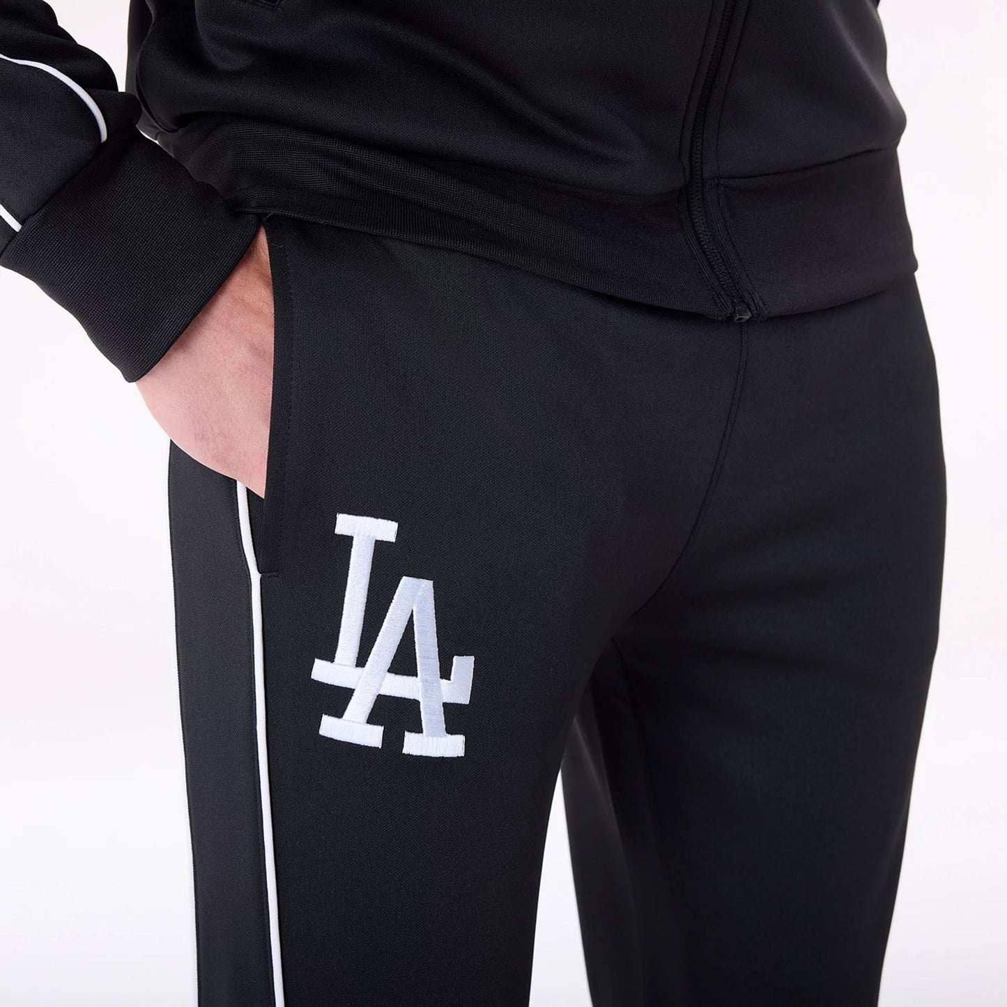 The Male model is wearing LA Dodgers MLB Track Pants Black Fleece Joggers 5