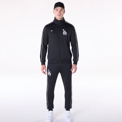 The Male model is wearing LA Dodgers MLB Track Pants Black Fleece Joggers 8