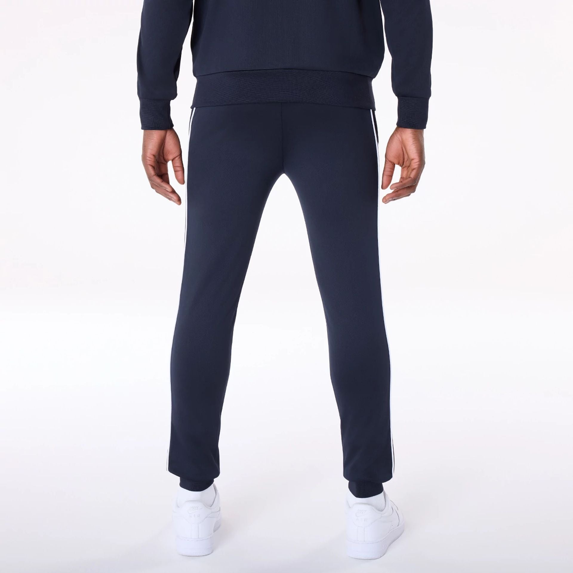 The Male model is wearing New York Yankees MLB Poly Track Set Navy Track Suit 5