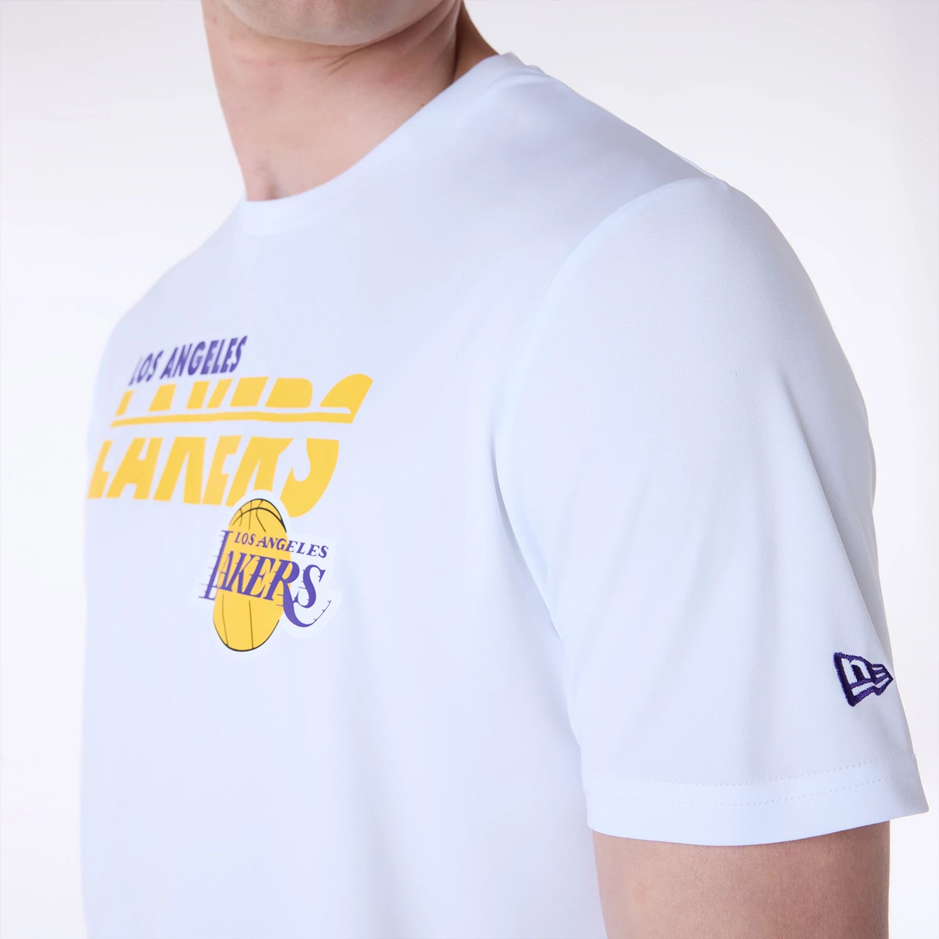 The Male model is wearing LA Lakers NBA Essentials White T-Shirt 6