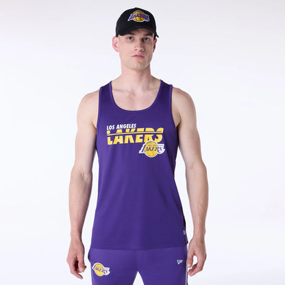 The Male model is wearing LA Lakers NBA Essentials Purple Vest 1