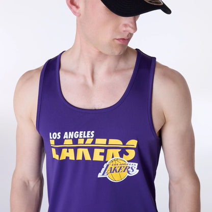 The Male model is wearing LA Lakers NBA Essentials Purple Vest 3