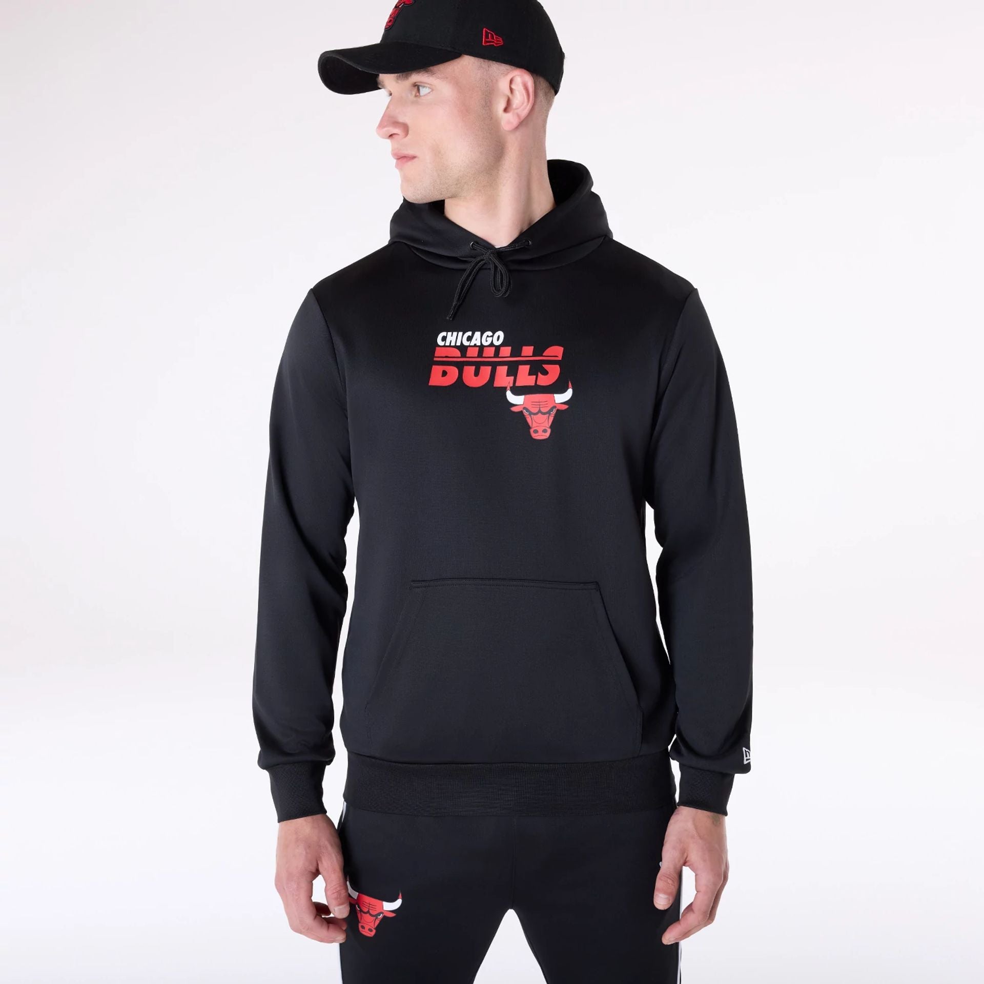 The Male model is wearing Chicago Bulls NBA Essentials Black Pullover Hoodie 1