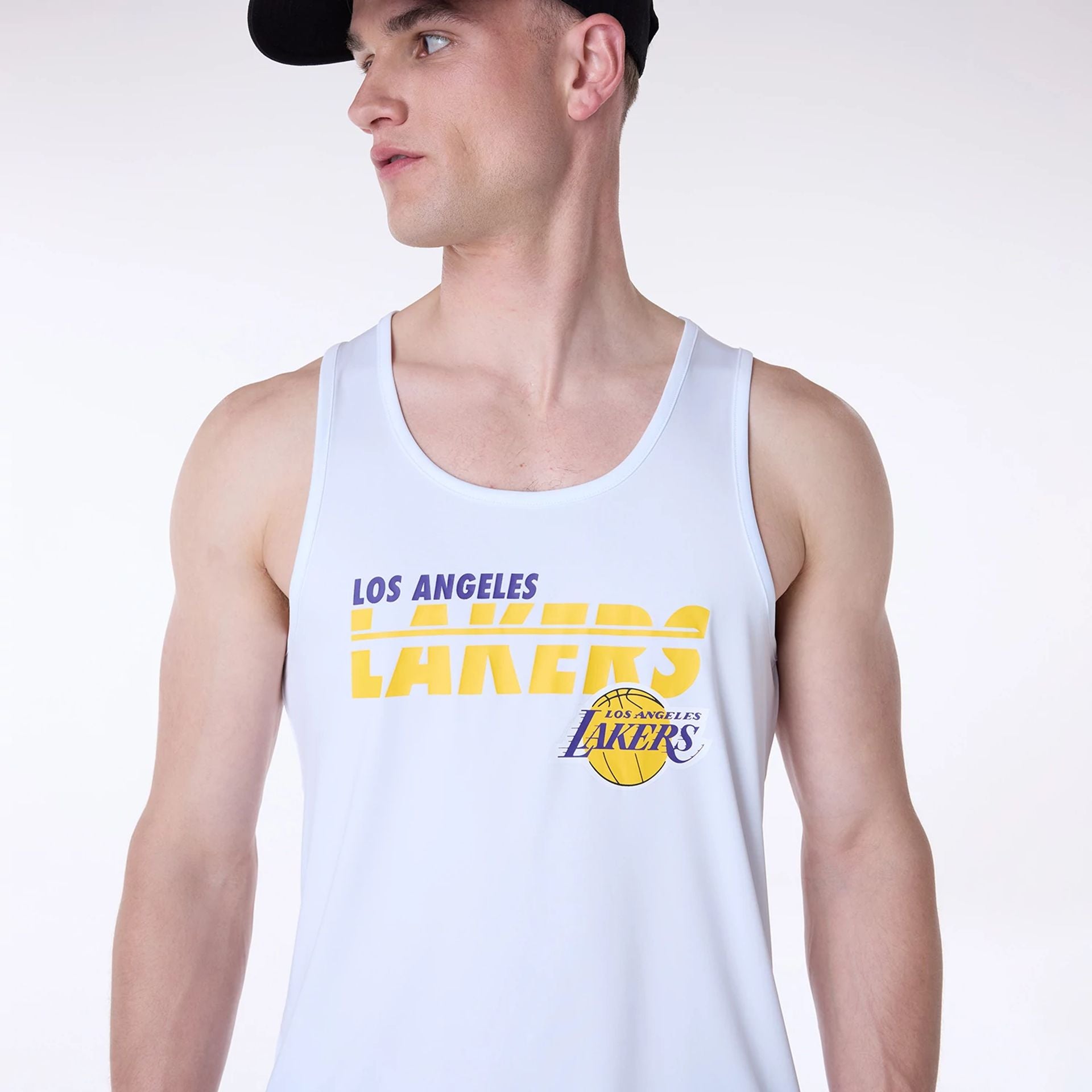 The Male model is wearing LA Lakers NBA Essentials White Vest 5