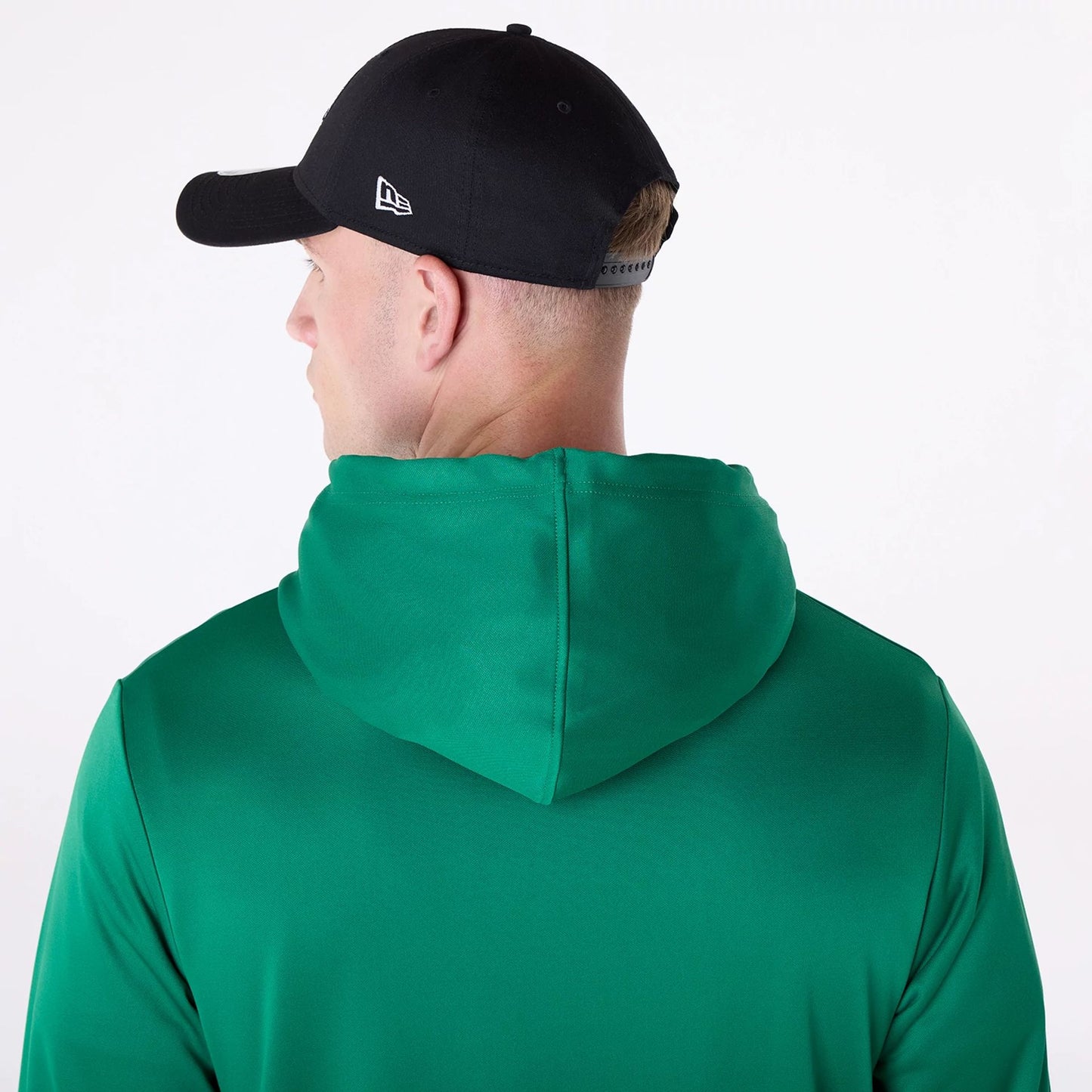 The Male model is wearing Boston Celtics NBA Essentials Green Pullover Hoodie 6