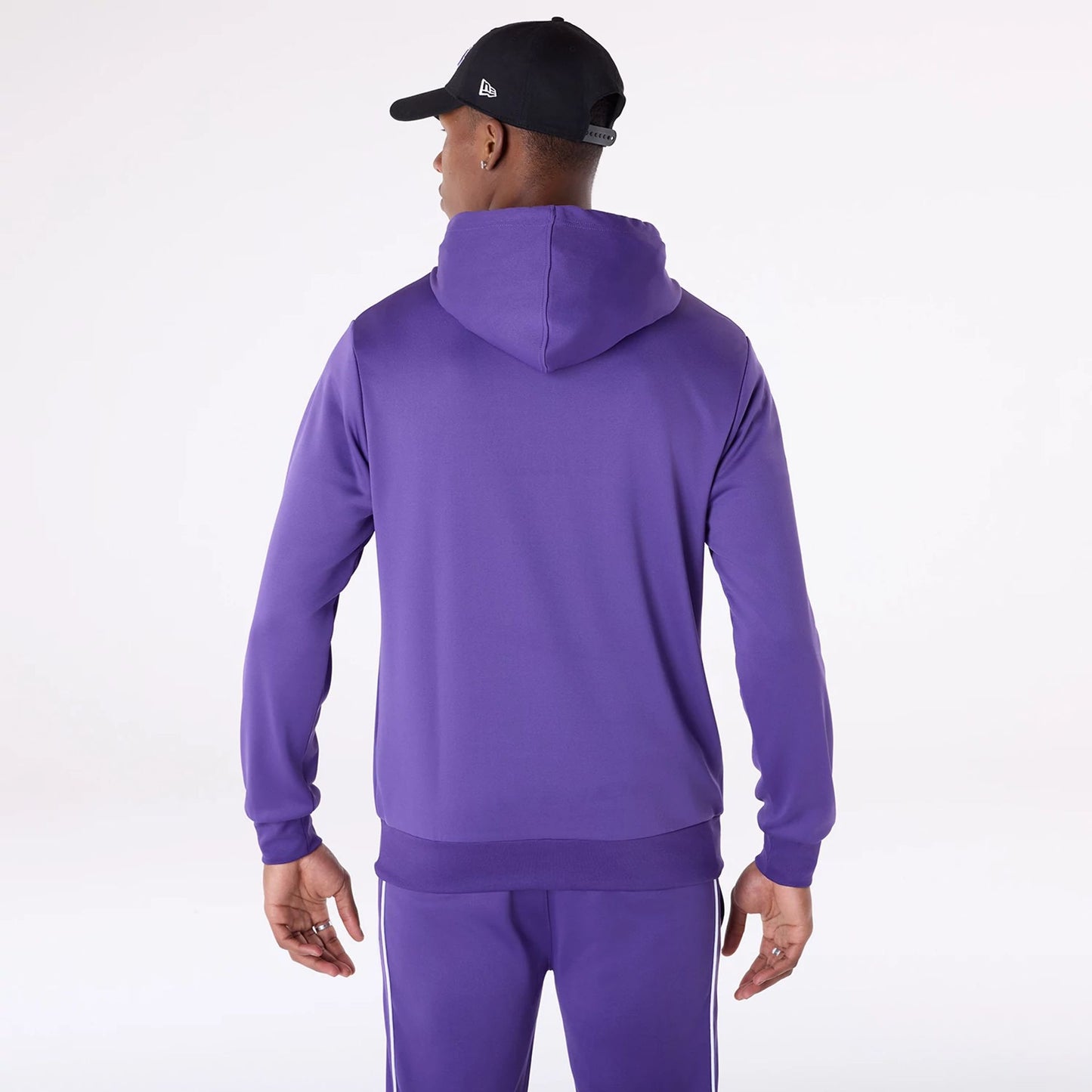 The Male model is wearing LA Lakers NBA Essentials Purple Pullover Hoodie 2