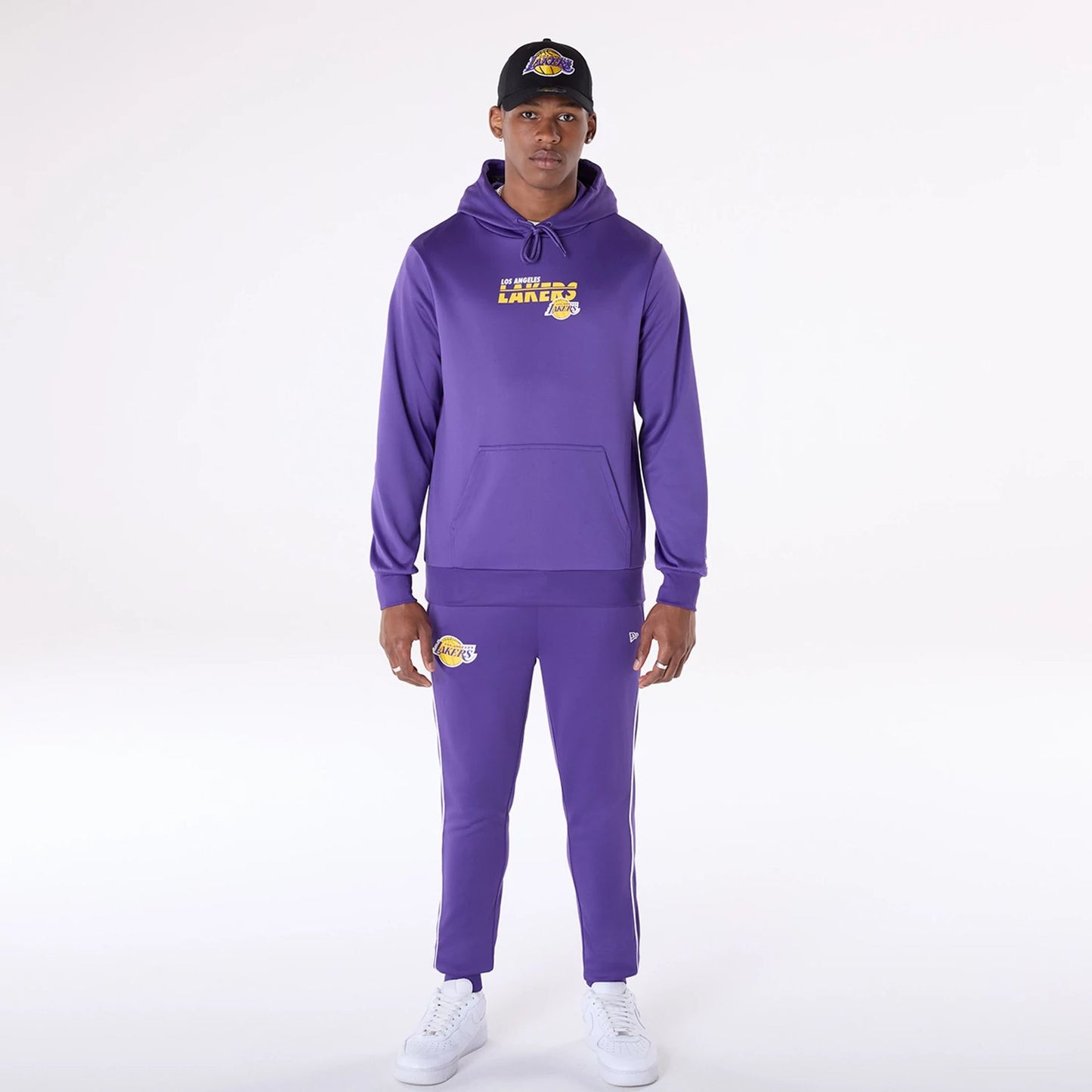 The Male model is wearing LA Lakers NBA Essentials Purple Pullover Hoodie 6