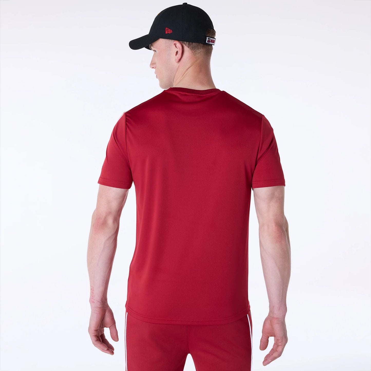 The Male model is wearing Miami Heat NBA Essentials Dark Red T-Shirt 2