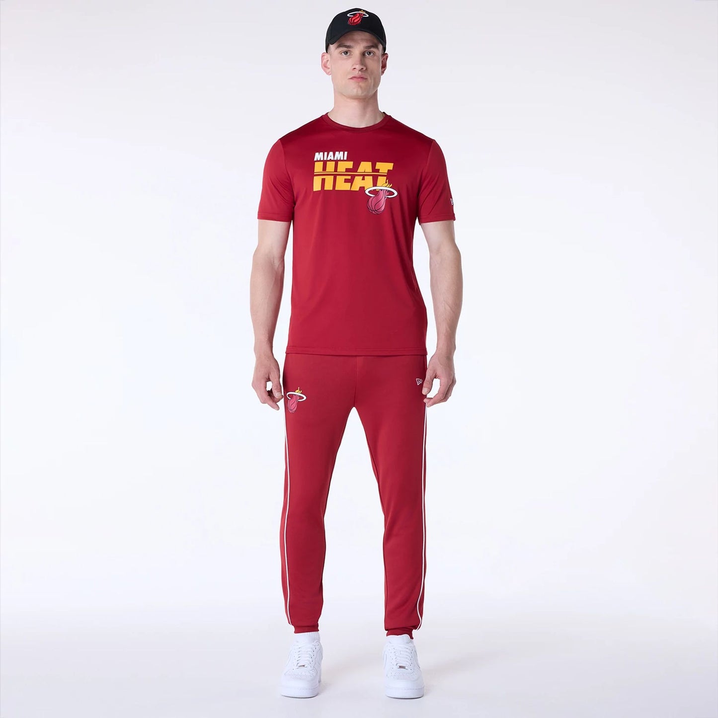 The Male model is wearing Miami Heat NBA Essentials Dark Red T-Shirt 8