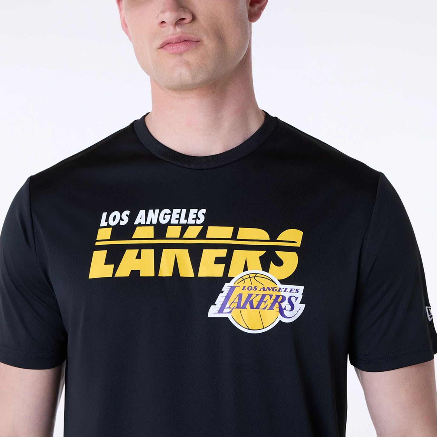 The Male model is wearing LA Lakers NBA Essentials Black T-Shirt 6