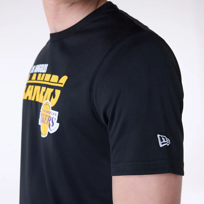 The Male model is wearing LA Lakers NBA Essentials Black T-Shirt 4