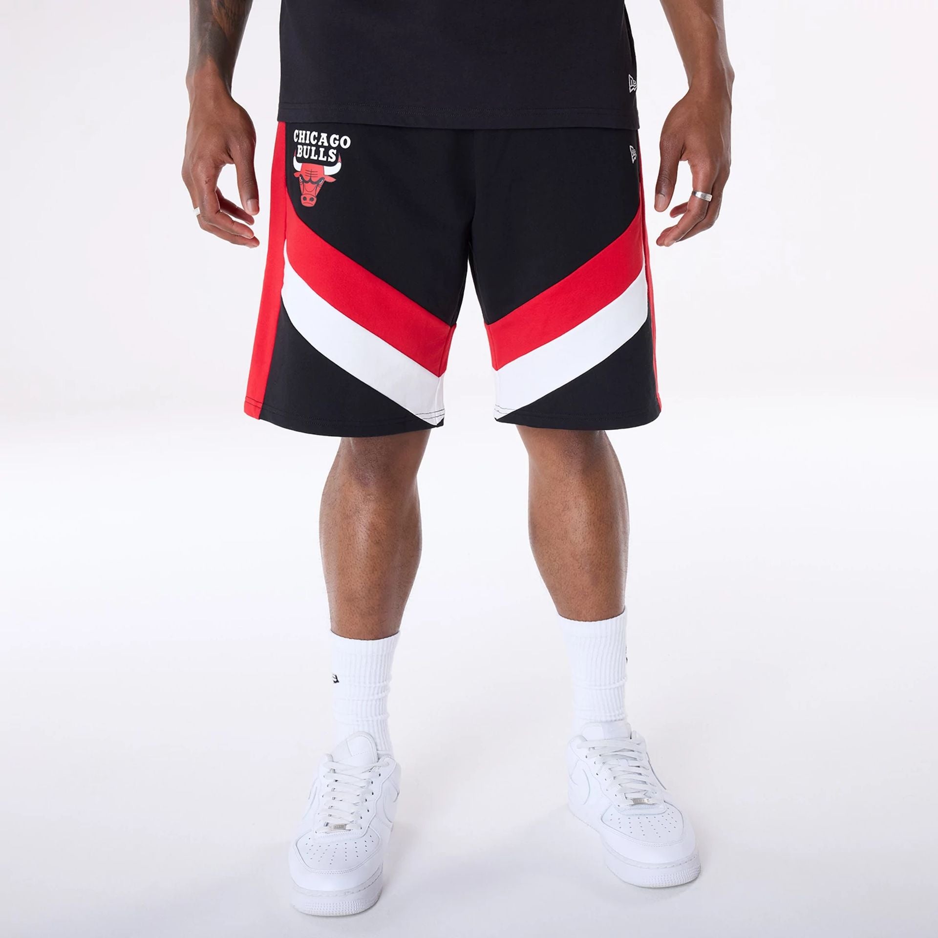 The Male model is wearing Chicago Bulls NBA Panel Black Shorts 1