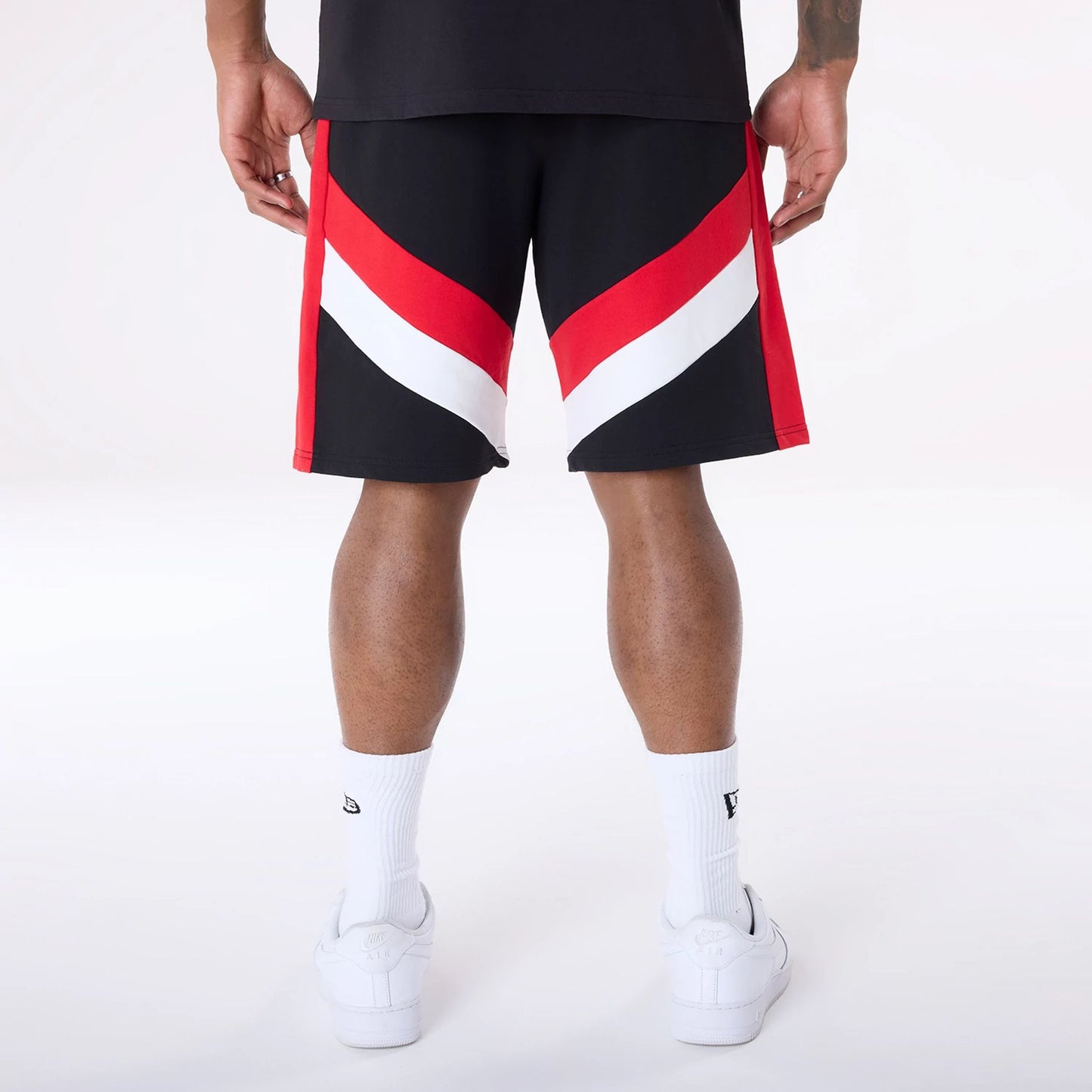 The Male model is wearing Chicago Bulls NBA Panel Black Shorts 2