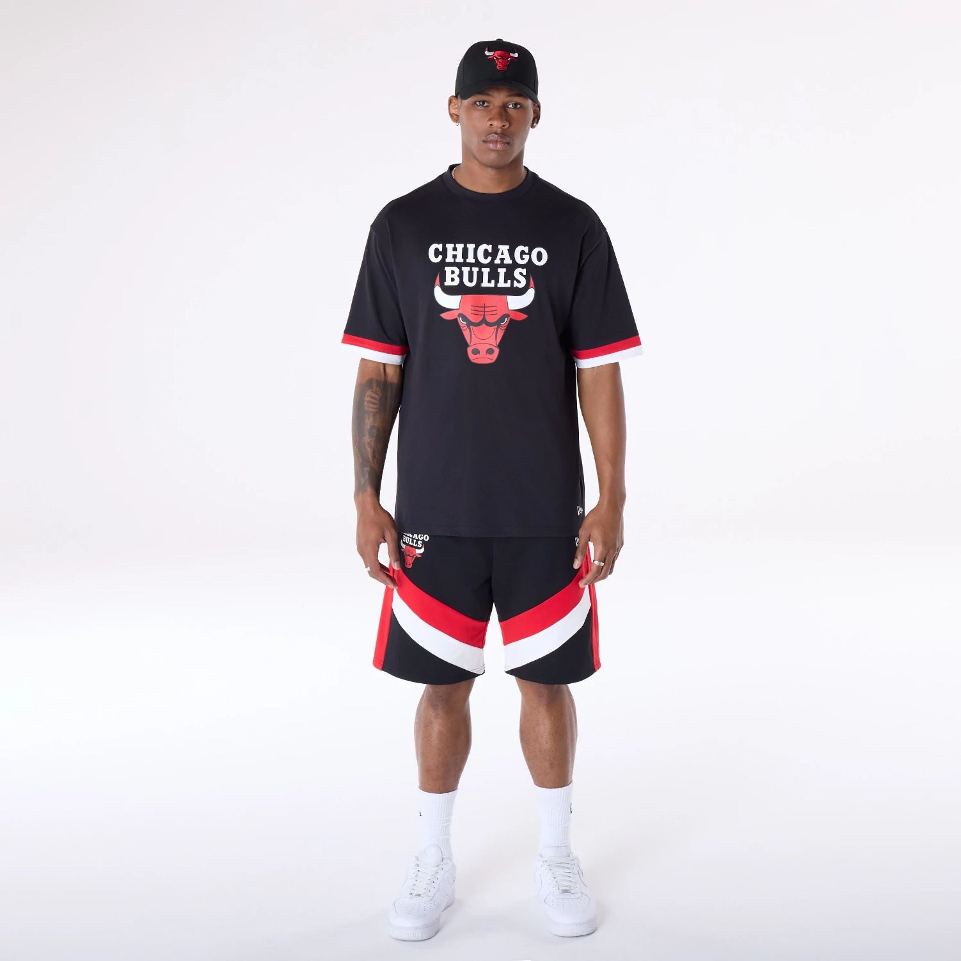 The Male model is wearing Chicago Bulls NBA Panel Black Shorts 8