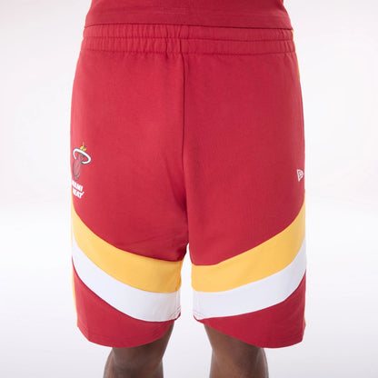 The Male model is wearing Miami Heat NBA Panel Dark Red Shorts 4