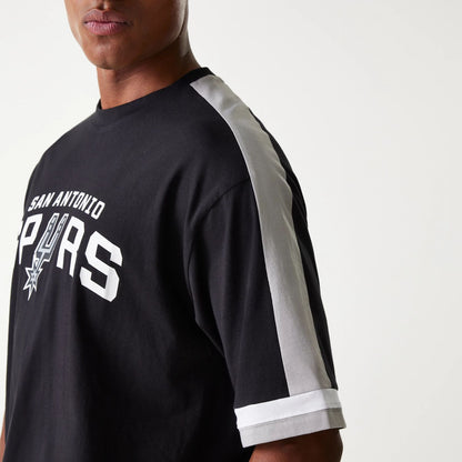 The Male model is wearing San Antonio Spurs NBA Panel Black Oversized T-Shirt 4