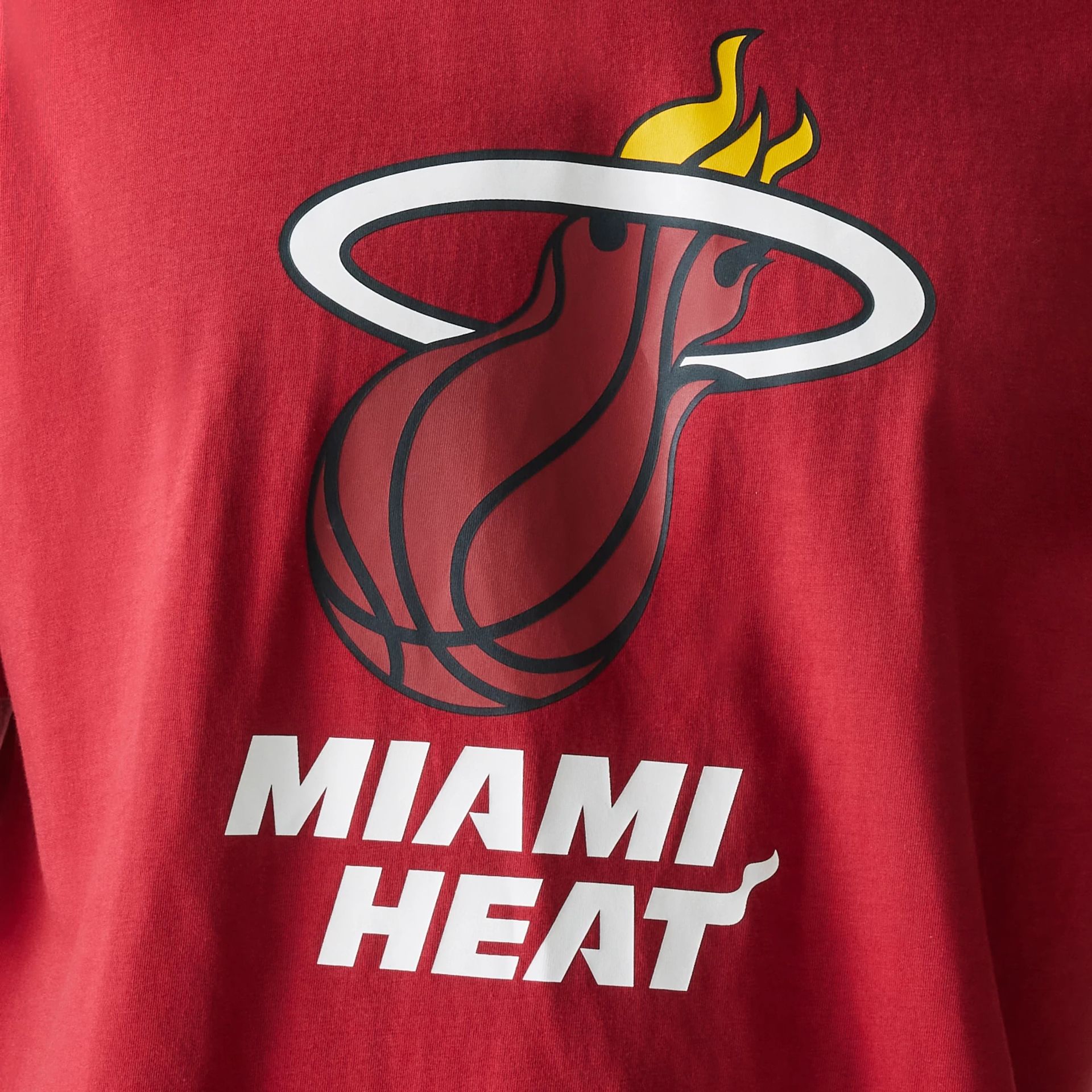 The Male model is wearing Miami Heat NBA Panel Dark Red Oversized T-Shirt 4