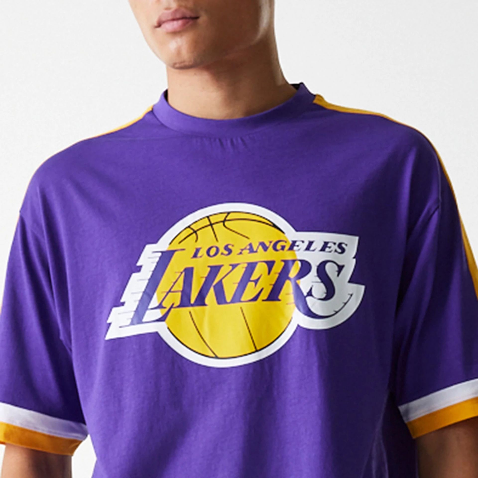 The Male model is wearing LA Lakers NBA Panel Purple Oversized T-Shirt 6