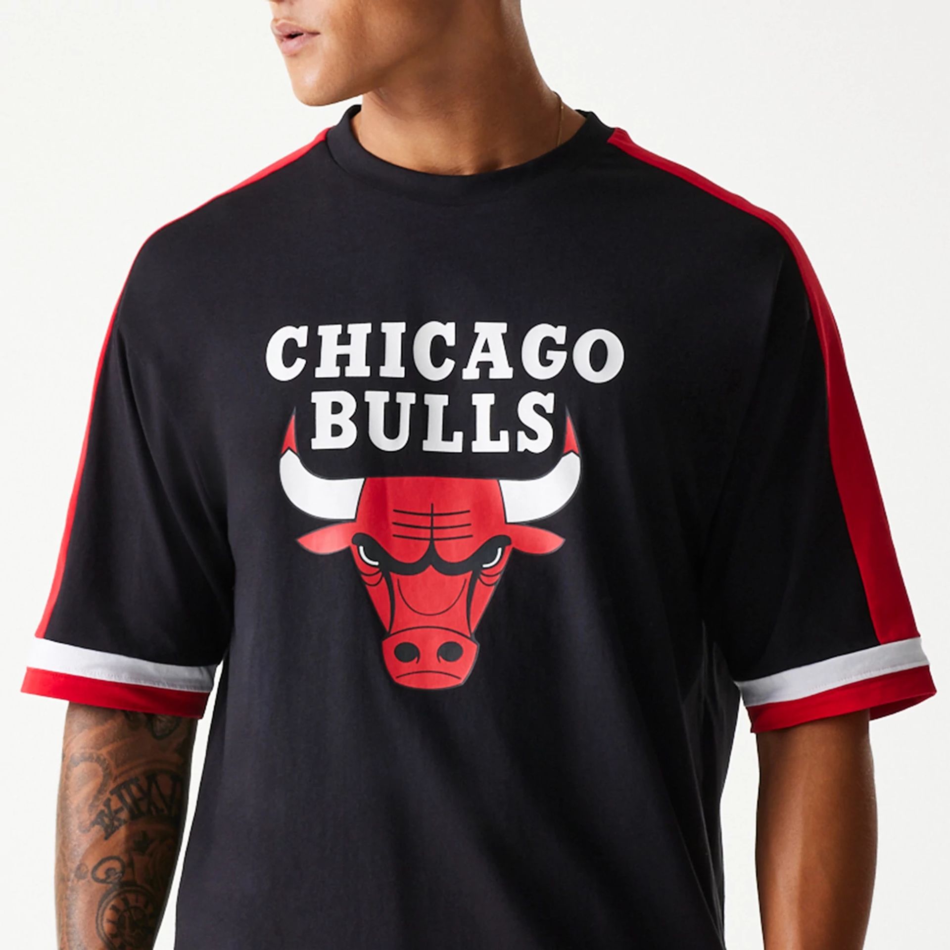 The Male model is wearing Chicago Bulls NBA Panel Black Oversized T-Shirt 3