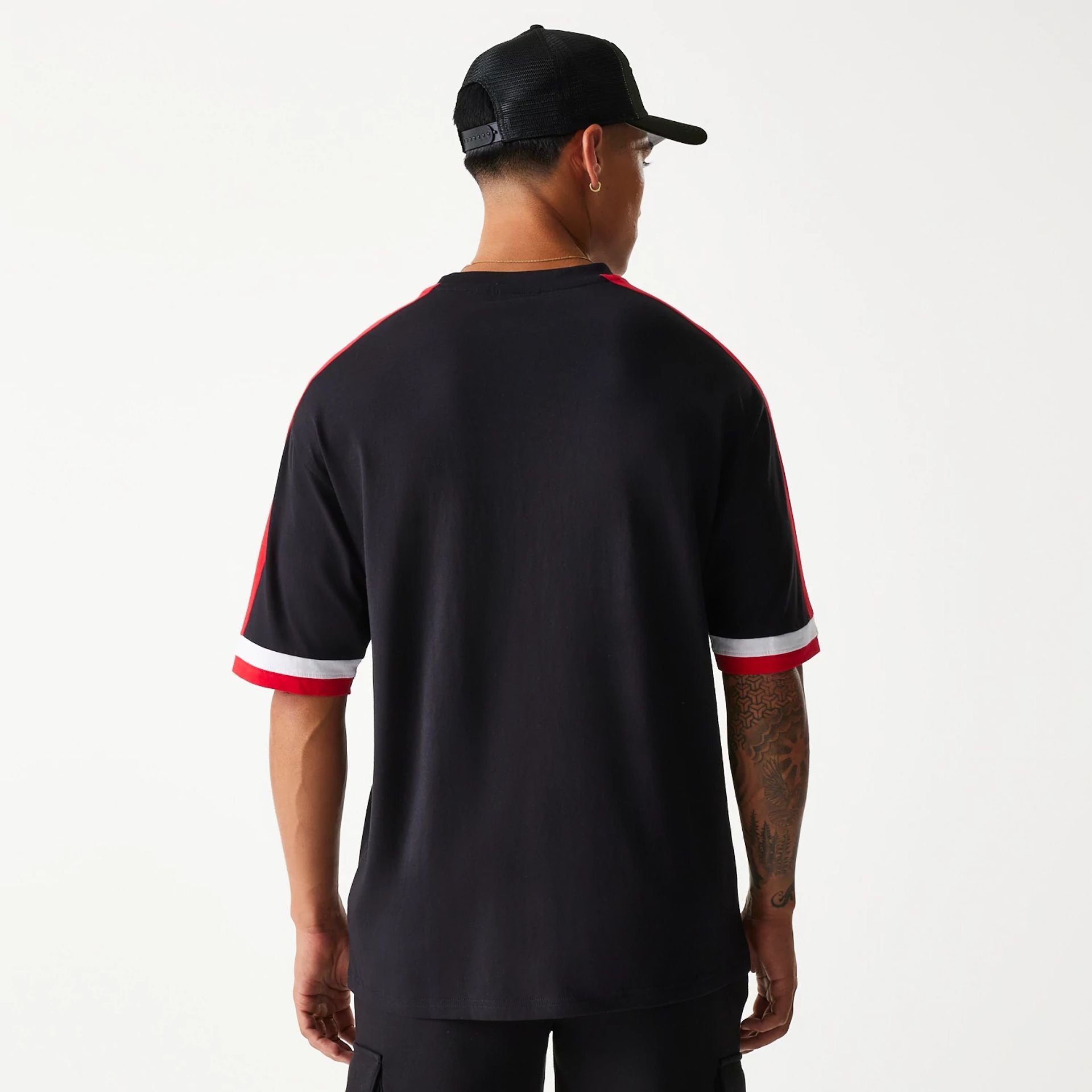 The Male model is wearing Chicago Bulls NBA Panel Black Oversized T-Shirt 2